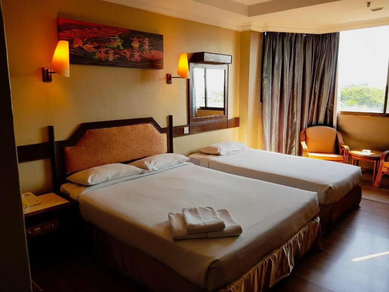 Bed in Hotel Grand Crystal