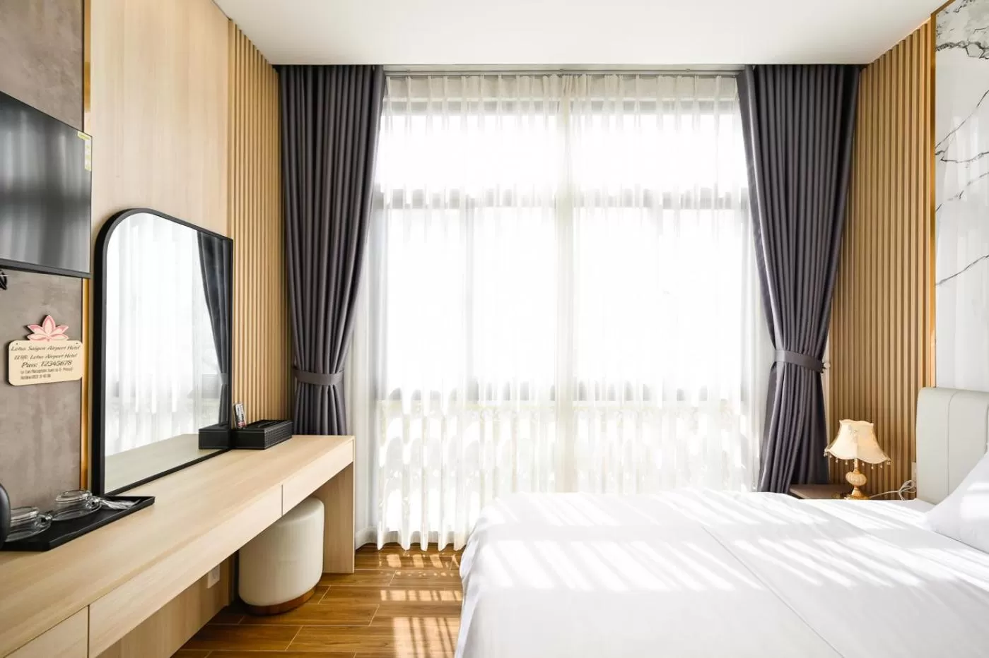 Photo of the whole room, Bed in Lotus Airport Hotel Saigon