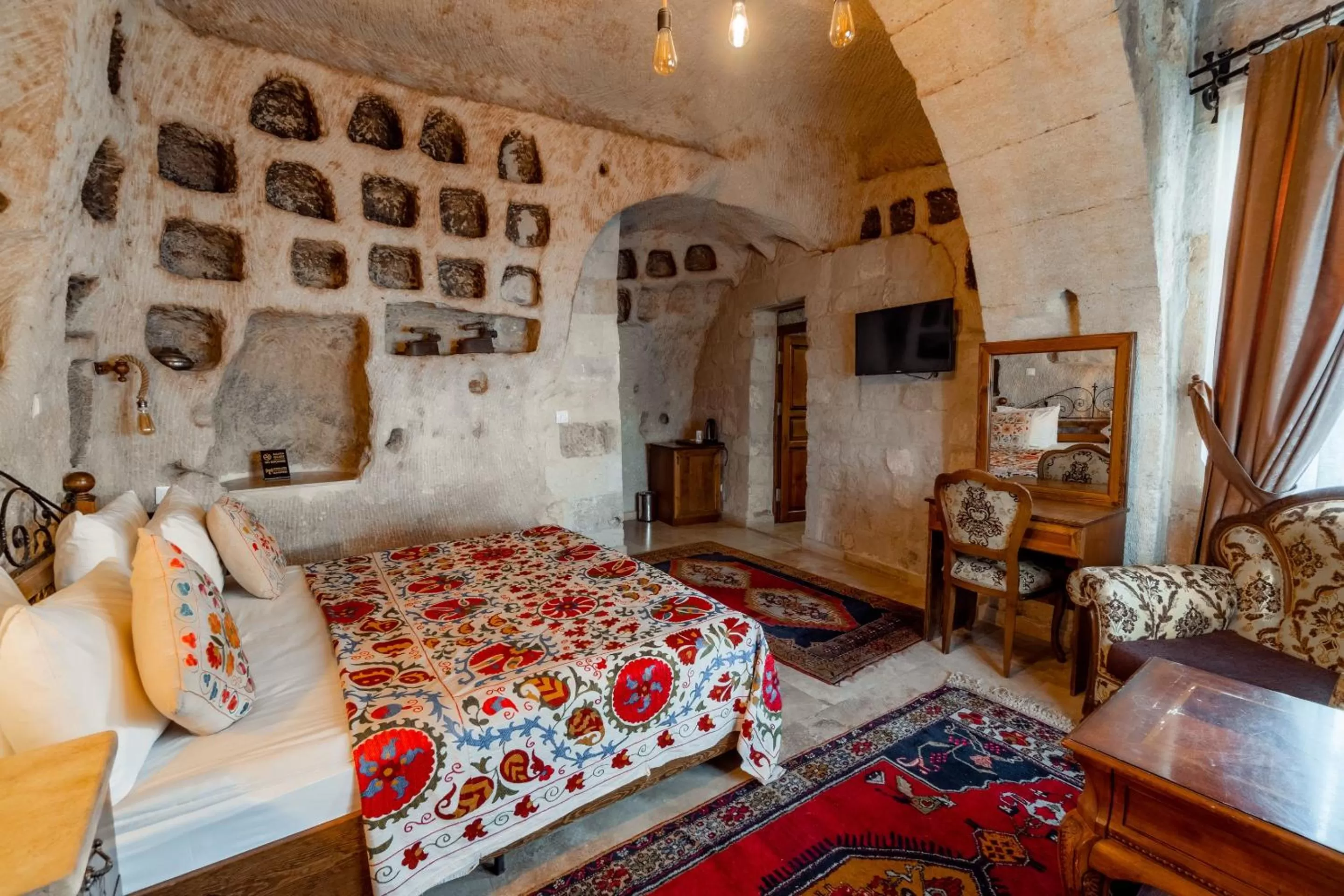 Bed in Amber Cave Suites