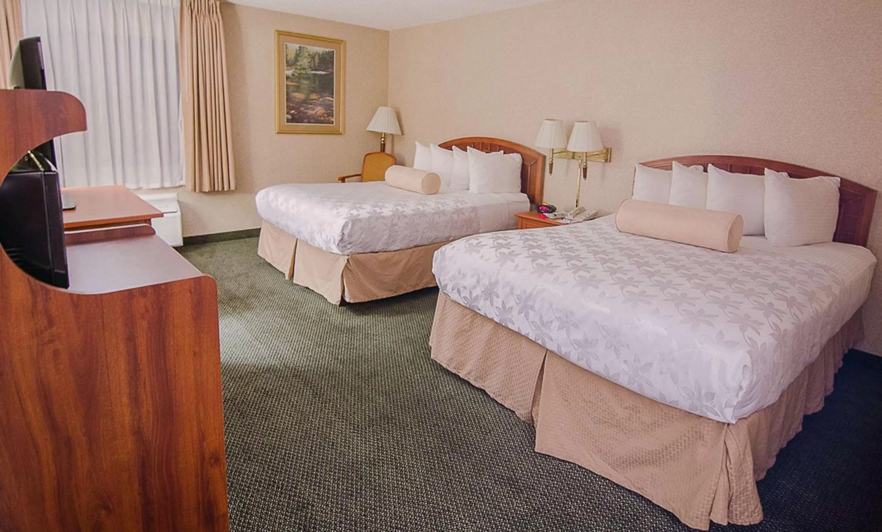 Bedroom, Bed in SureStay Plus Hotel by Best Western Reno Airport