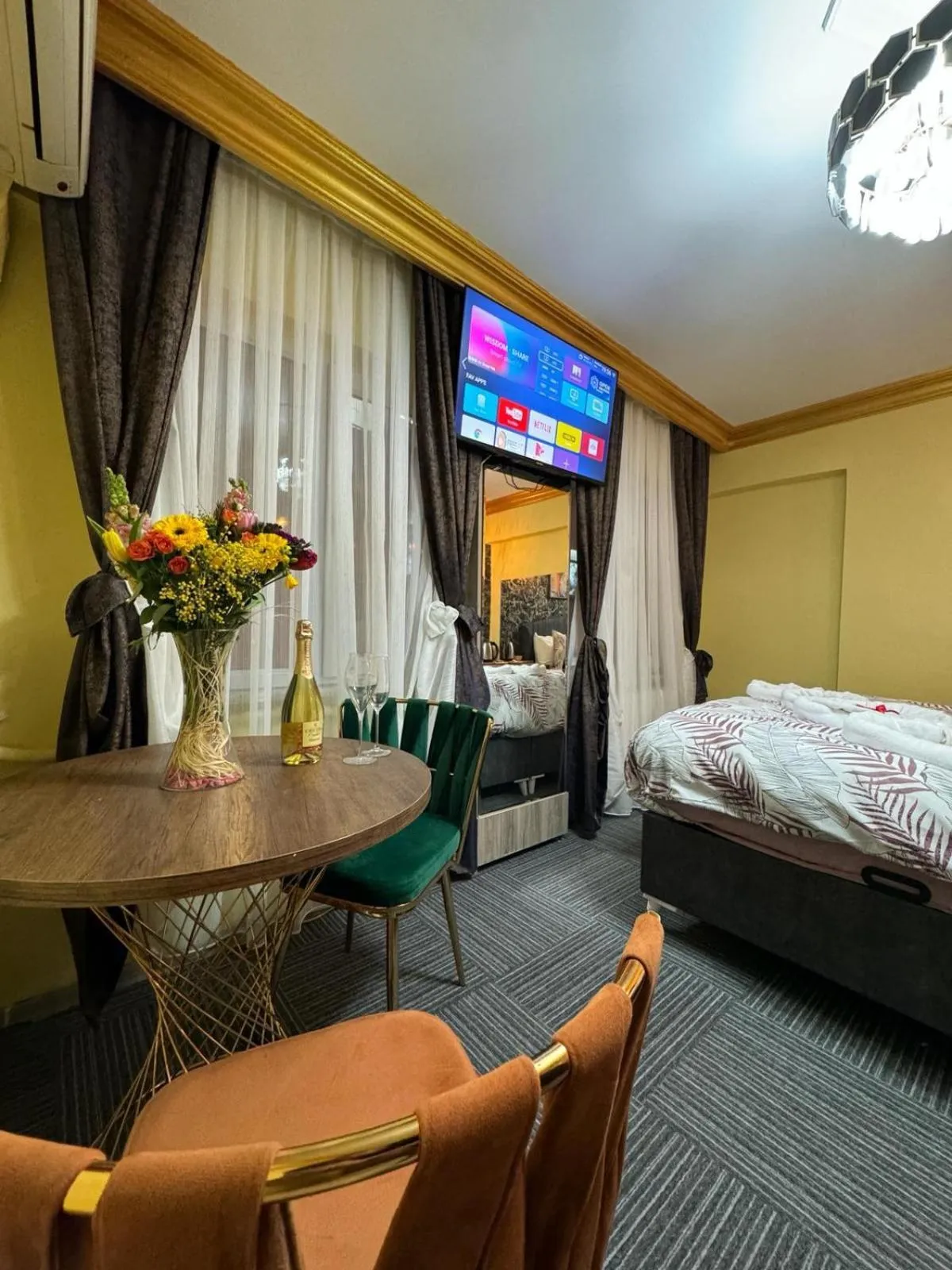 Bed in Royal Gur Hotel