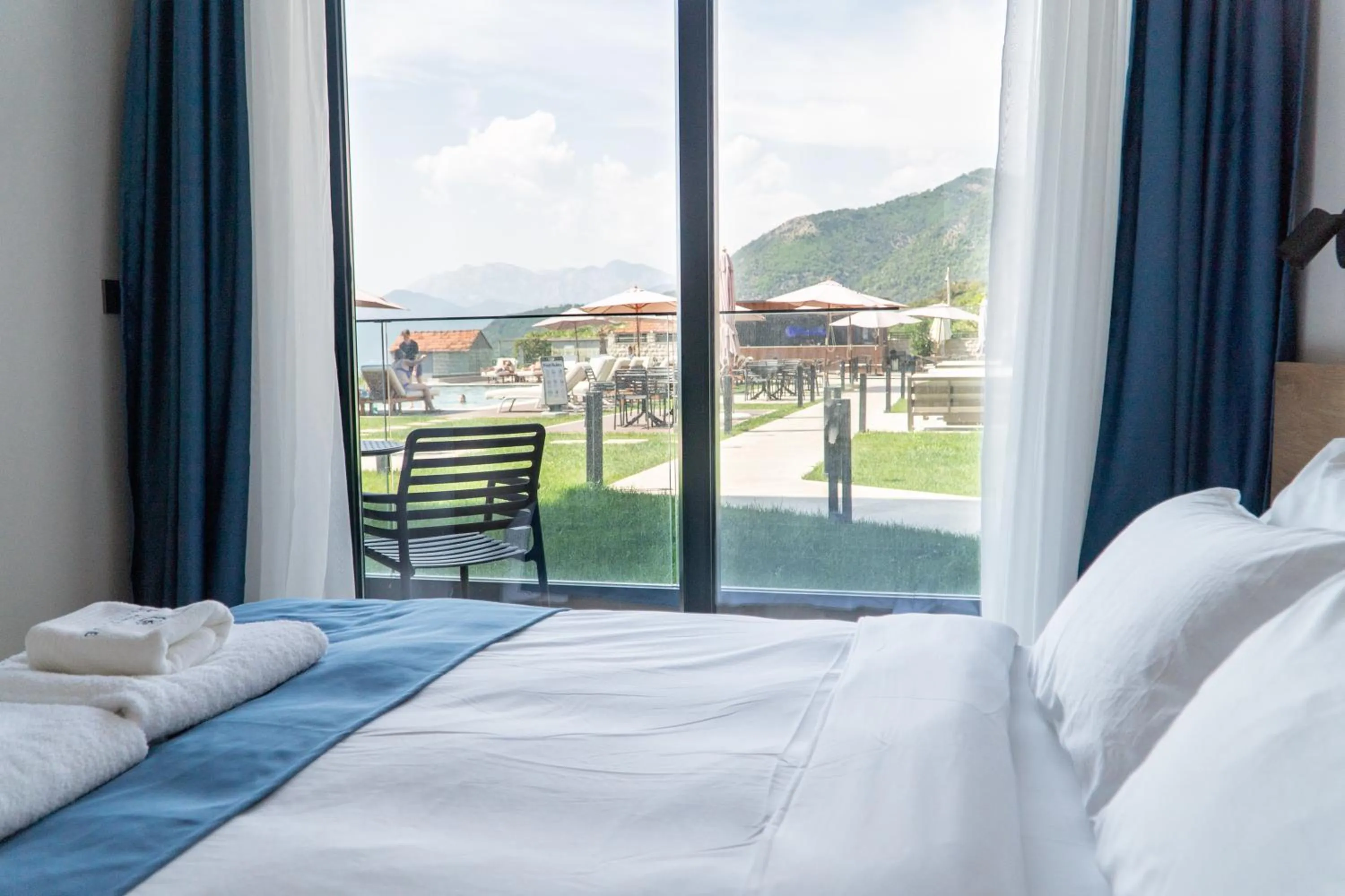 Bed in Royal Blue Resort & Residences