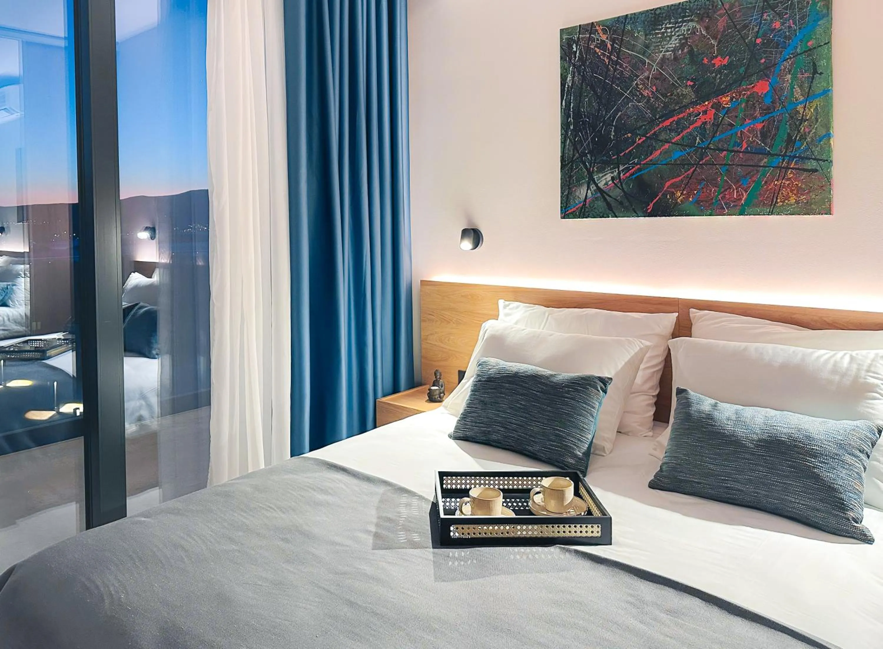 Bed in Royal Blue Resort & Residences