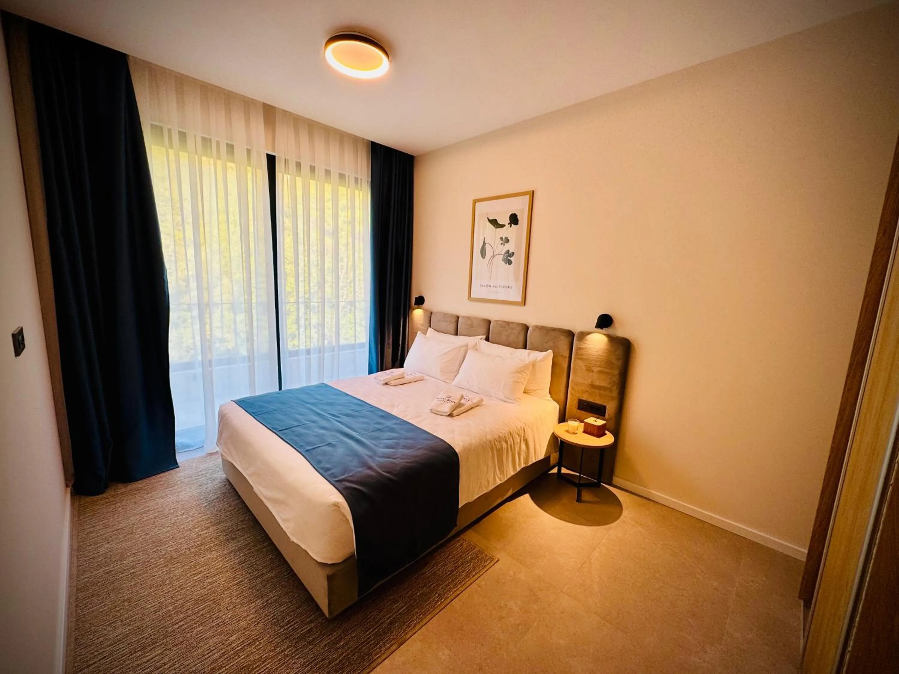 Bed in Royal Blue Resort & Residences