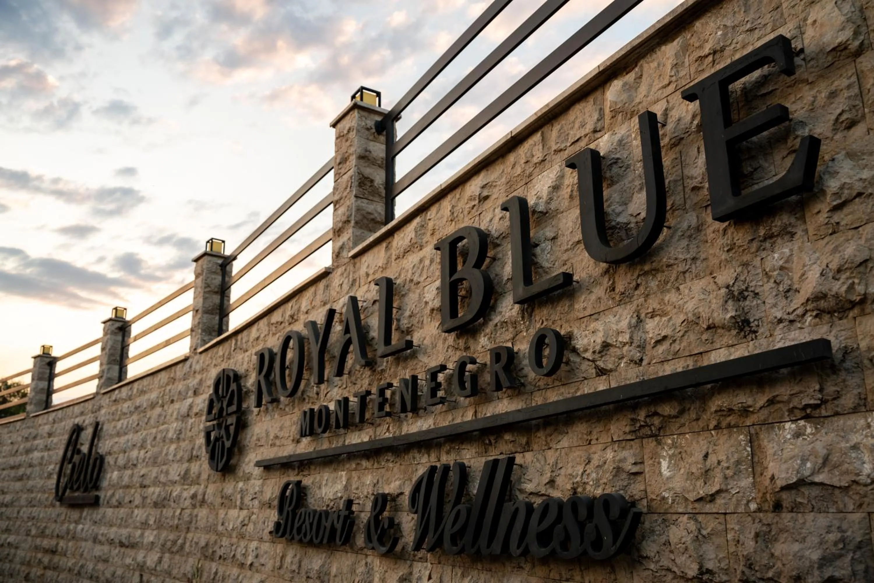 Property logo or sign in Royal Blue Resort & Residences