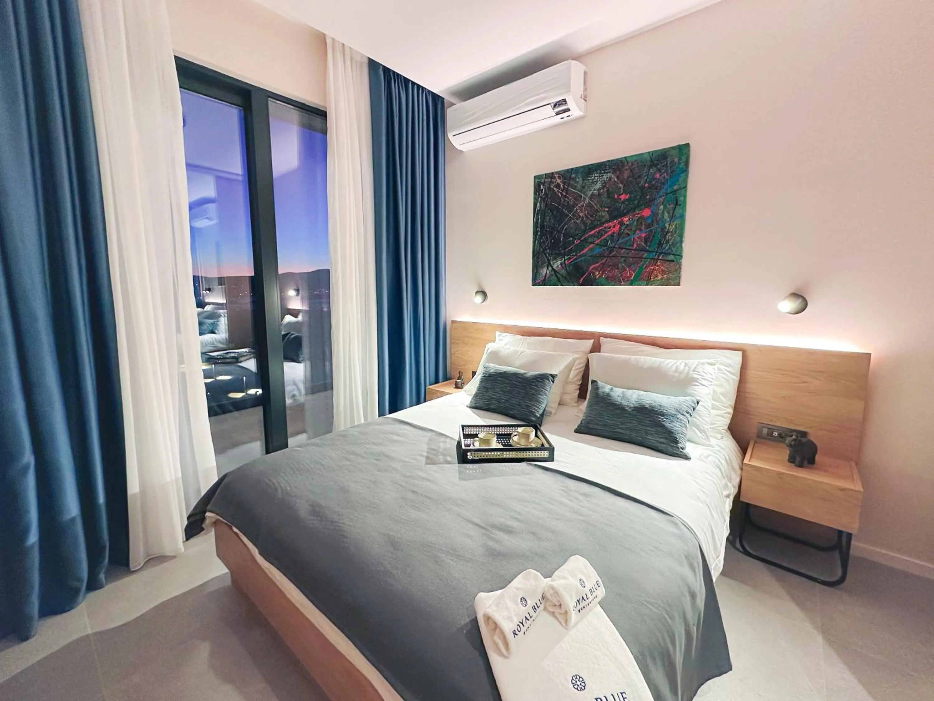 Bed in Royal Blue Resort & Residences