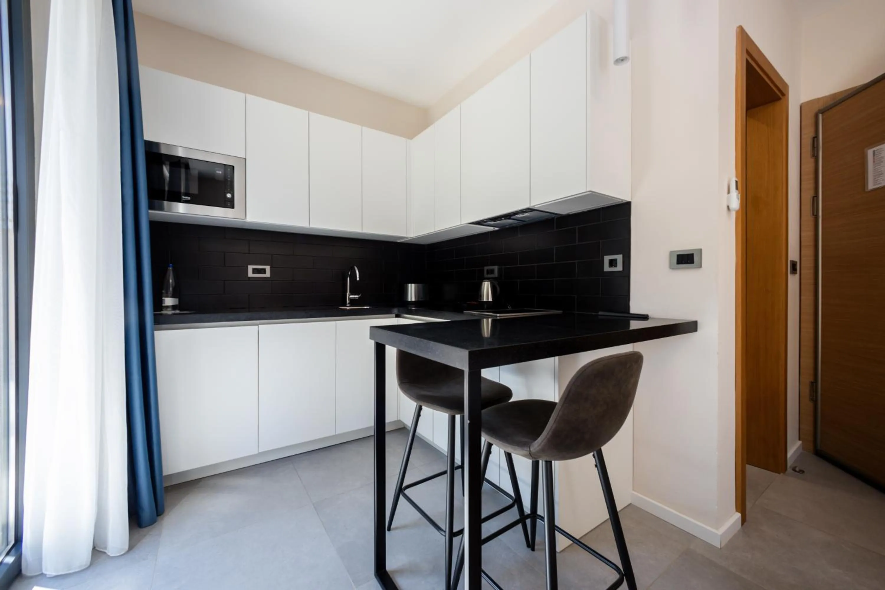 Kitchen or kitchenette in Royal Blue Resort & Residences