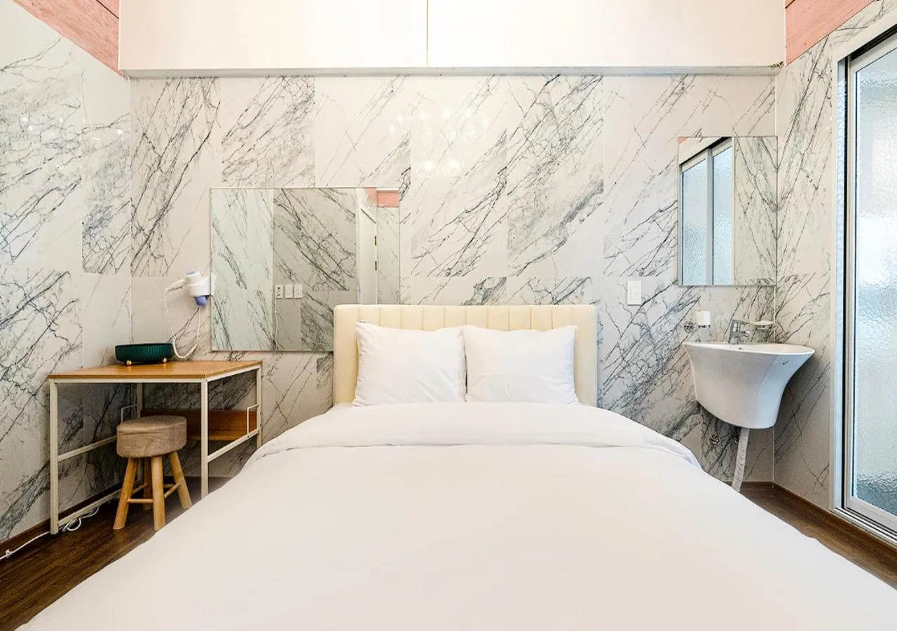 Bedroom, Bed in Woomigwan Hotel