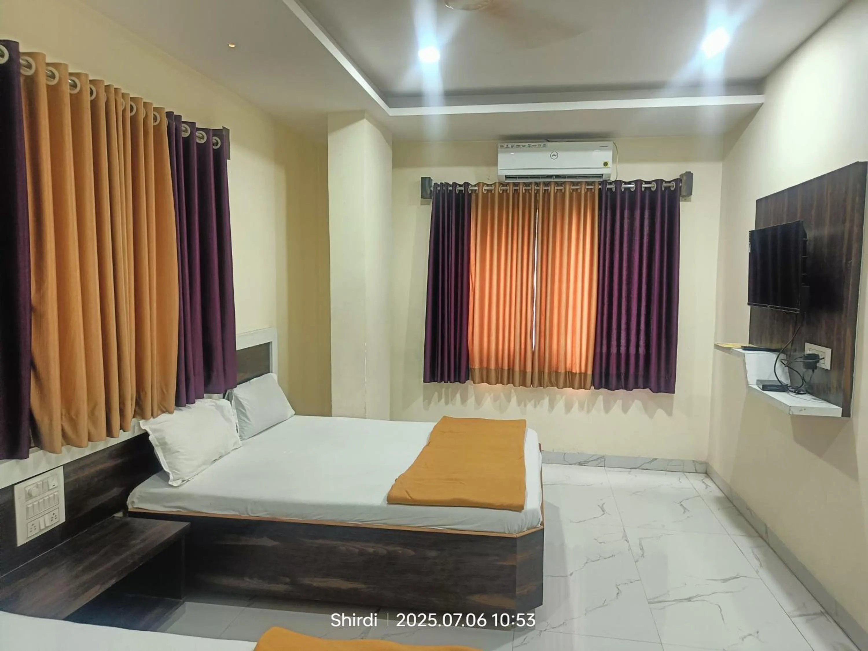 Bed in Hotel Sai viraj palace