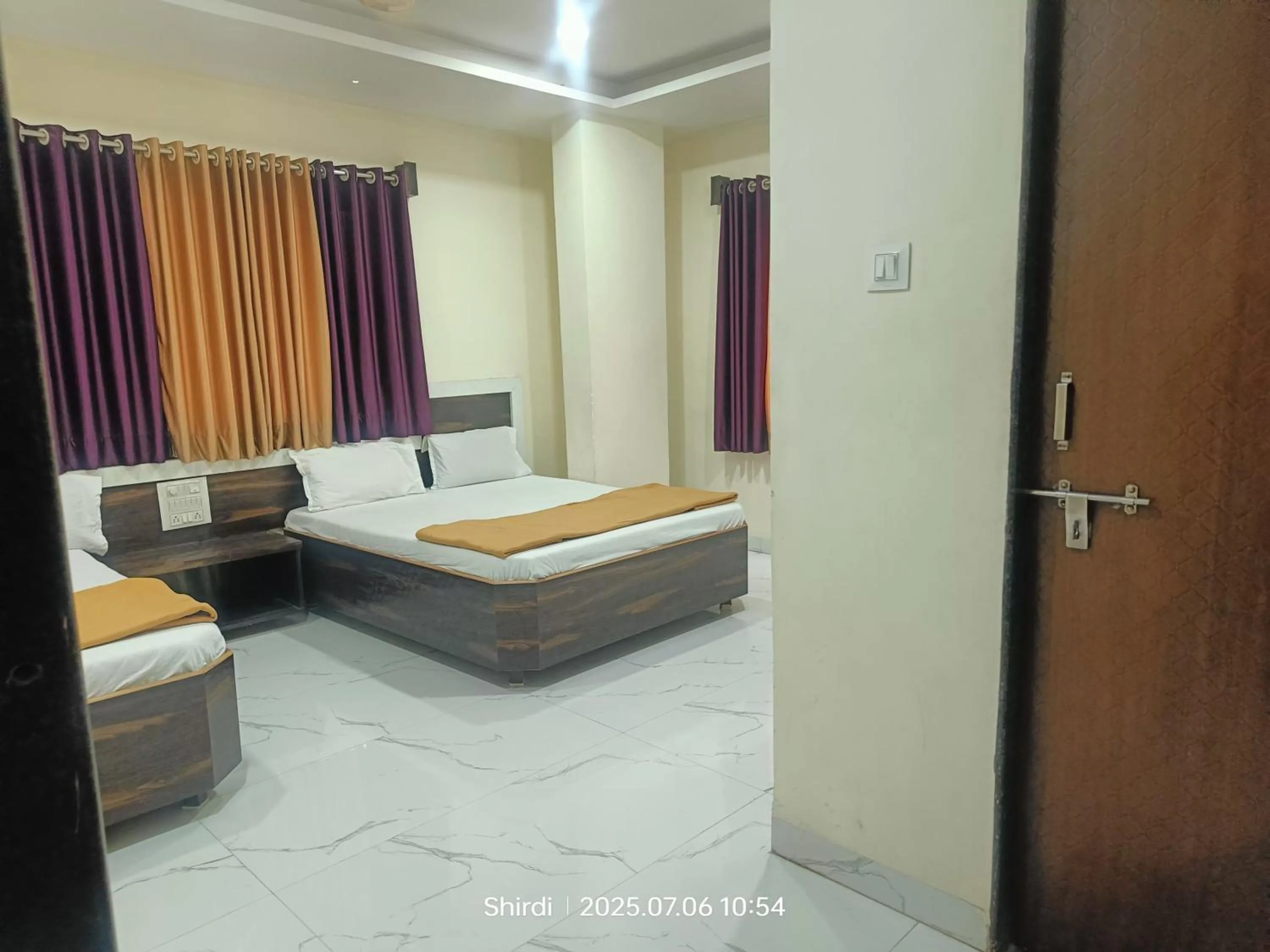 Bed in Hotel Sai viraj palace