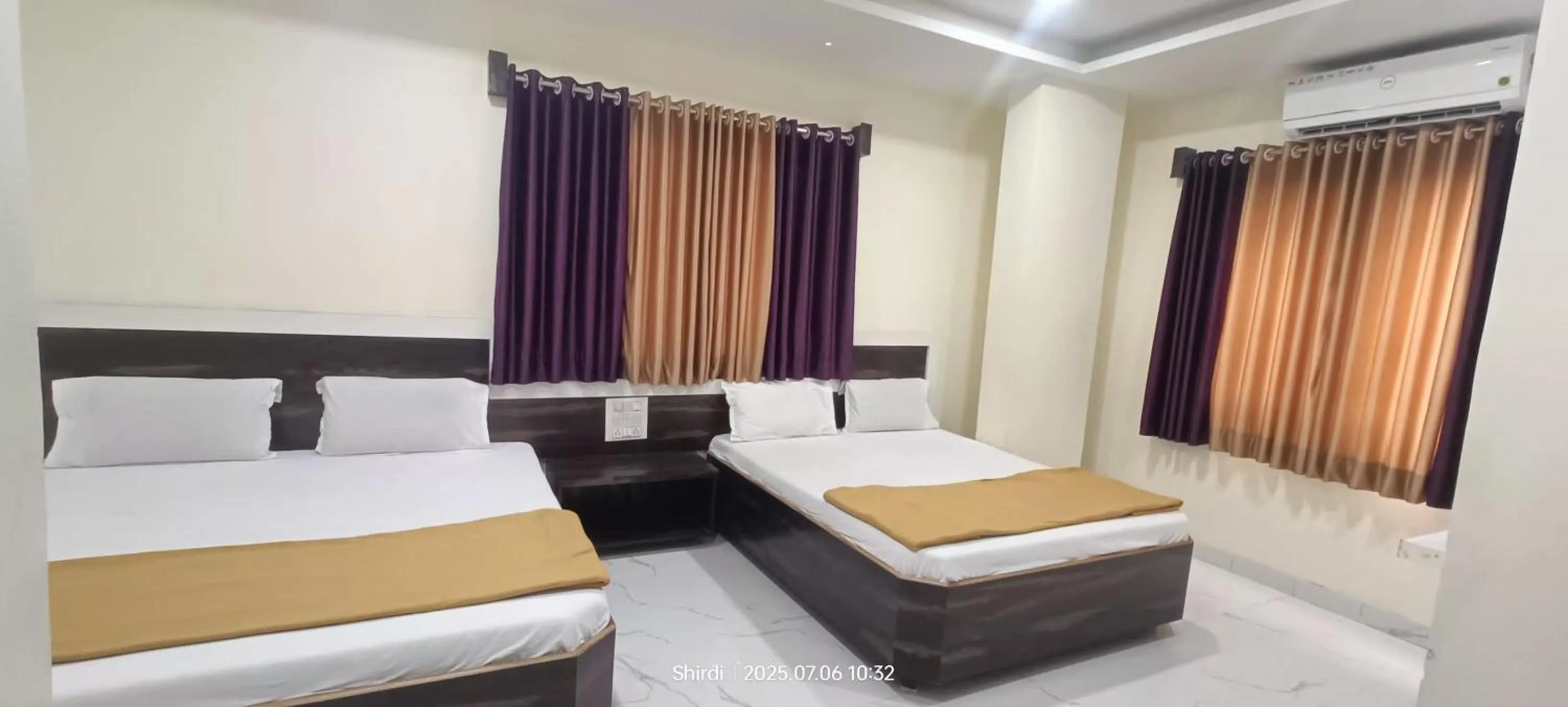 Bed in Hotel Sai viraj palace