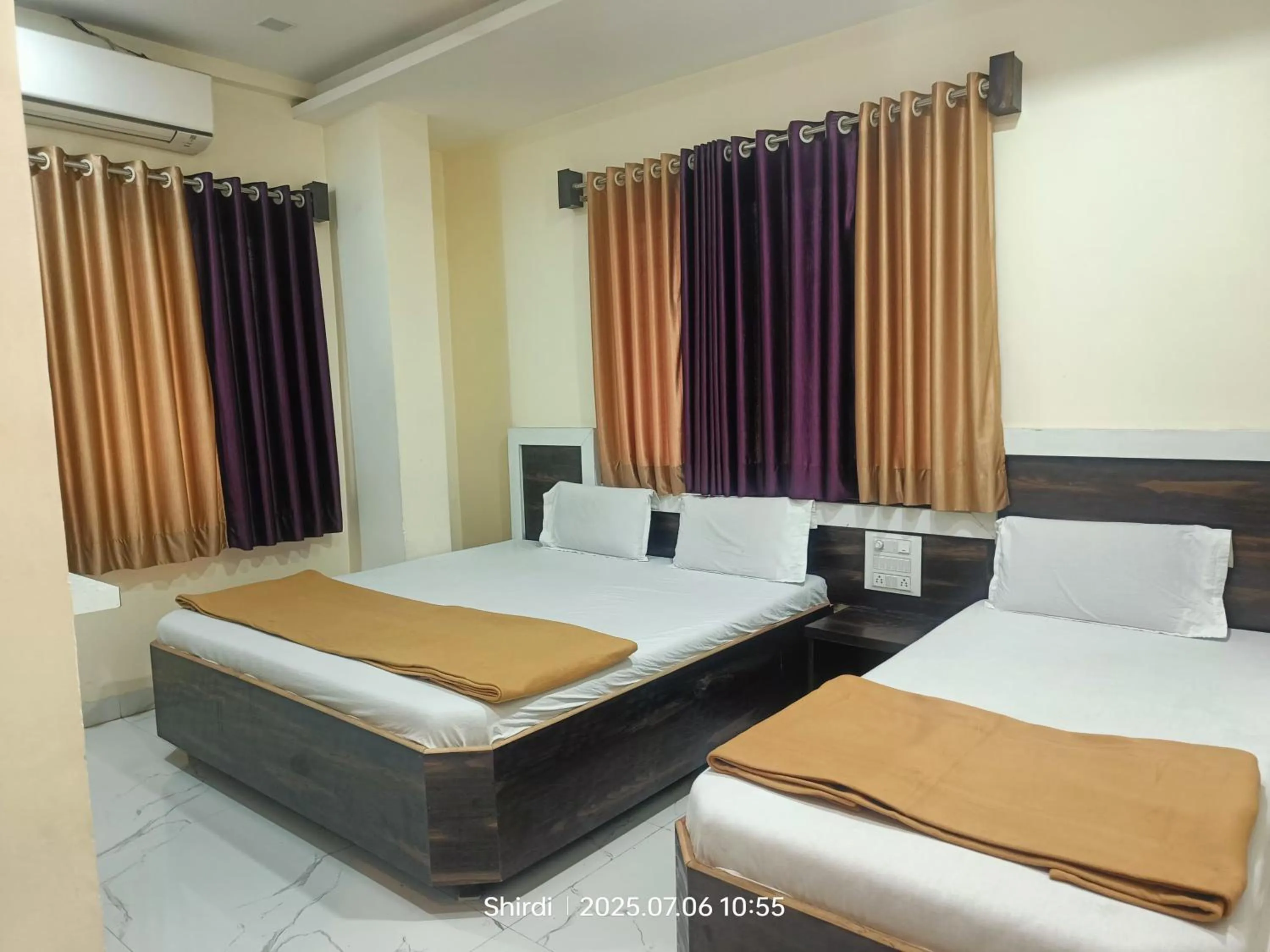 Bed in Hotel Sai viraj palace