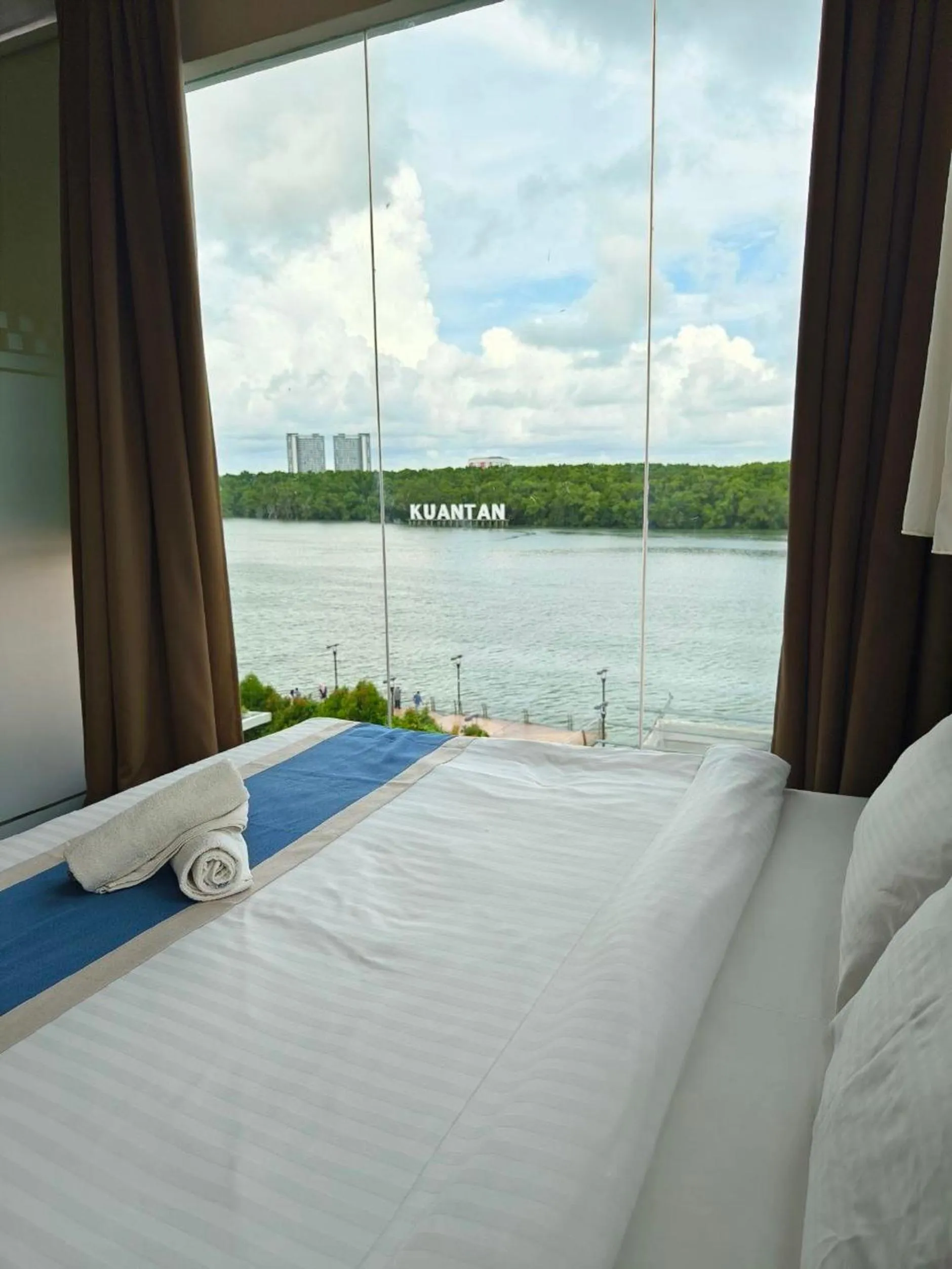 View (from property/room), Bed in The Riverbank Hotel By MRVJ Business