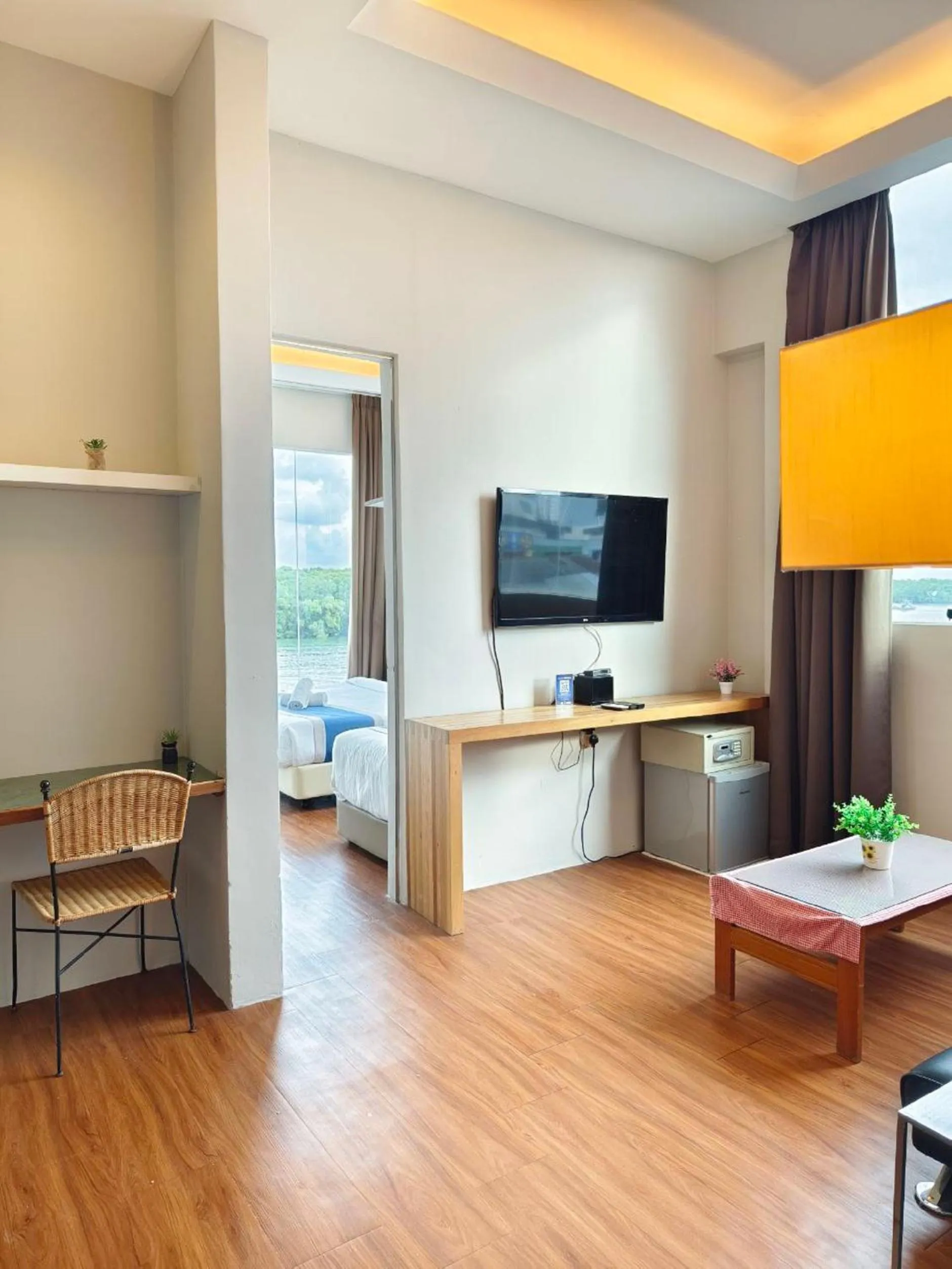 Bedroom in The Riverbank Hotel By MRVJ Business