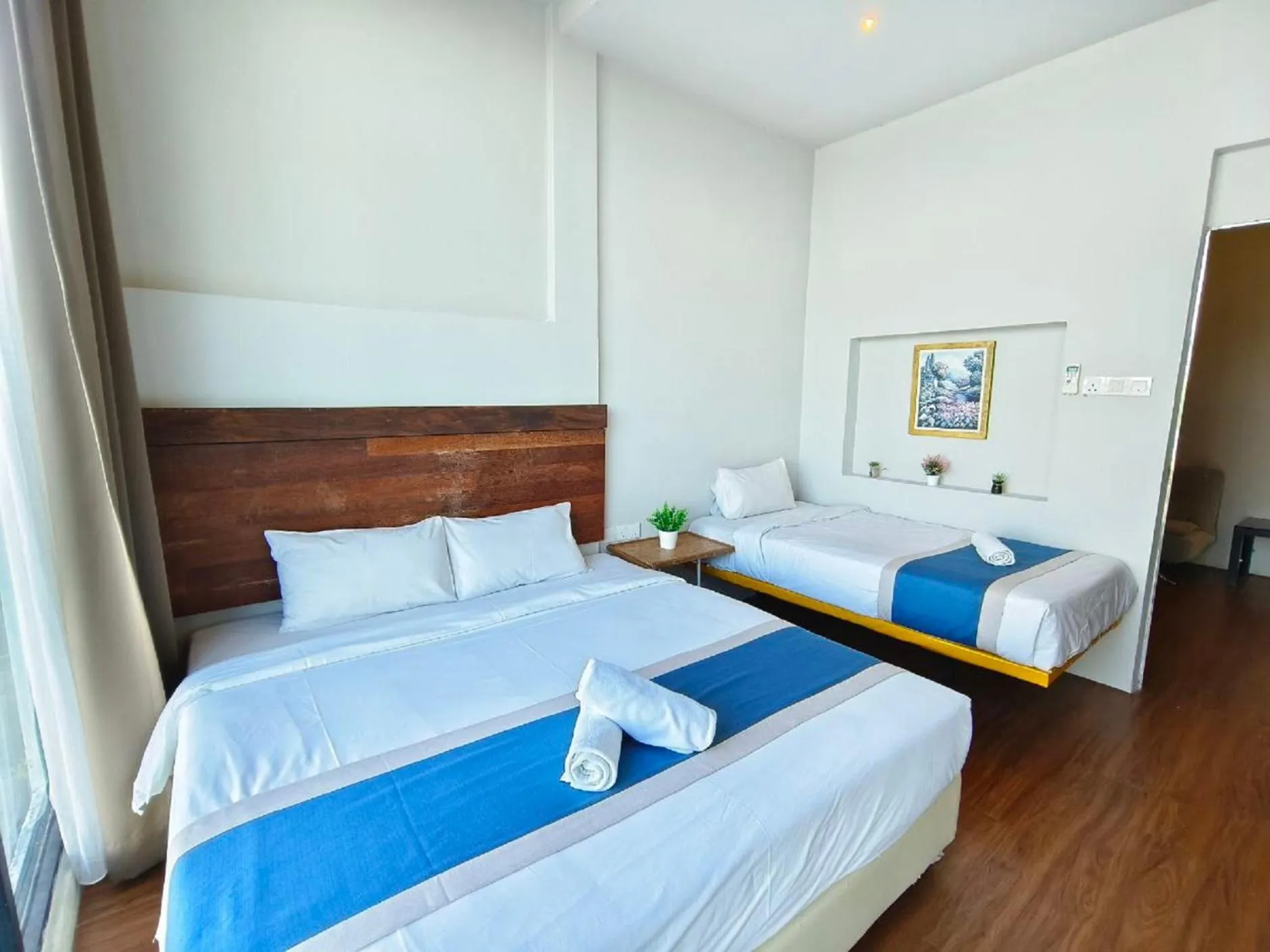 Bed in The Riverbank Hotel By MRVJ Business