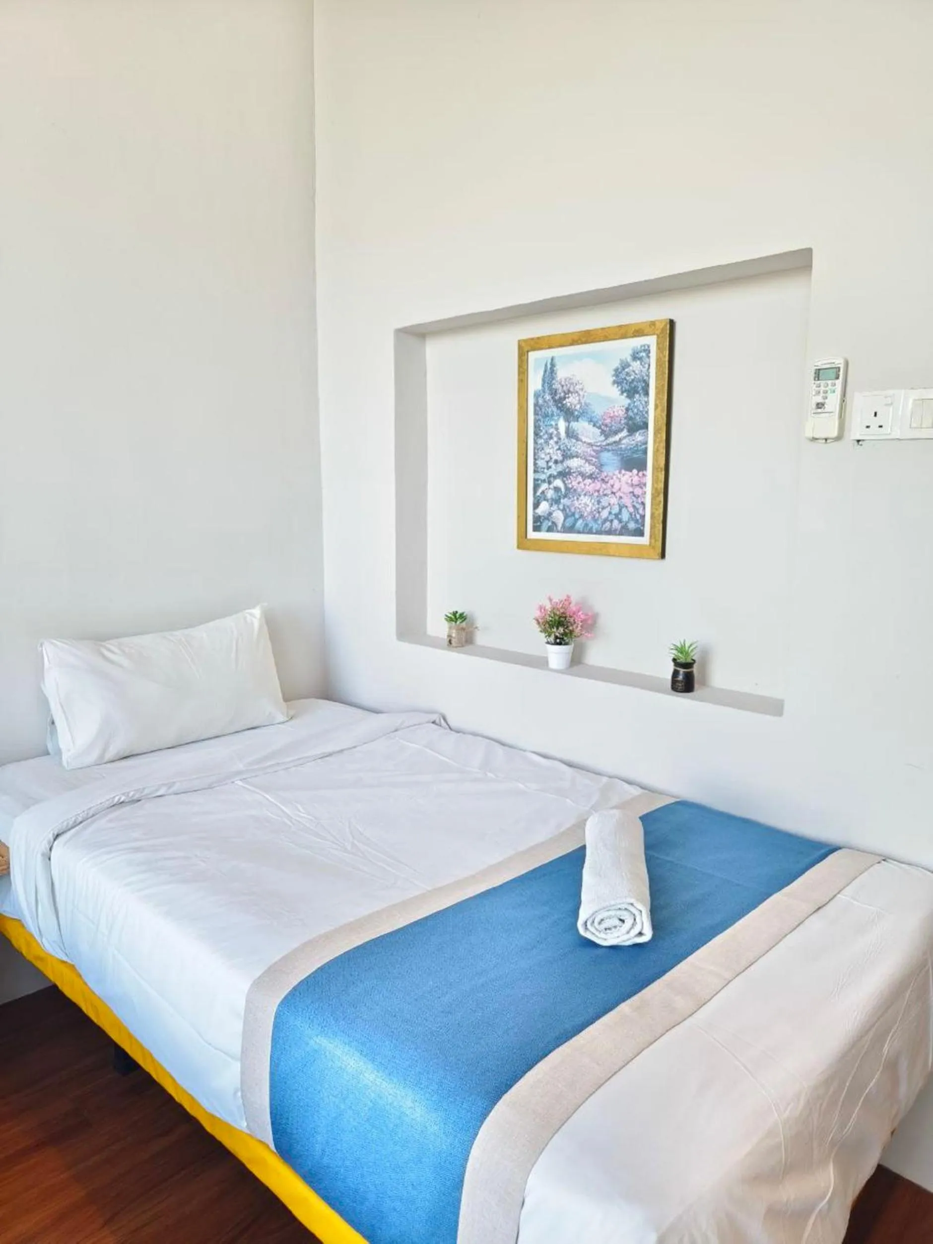 Bed in The Riverbank Hotel By MRVJ Business