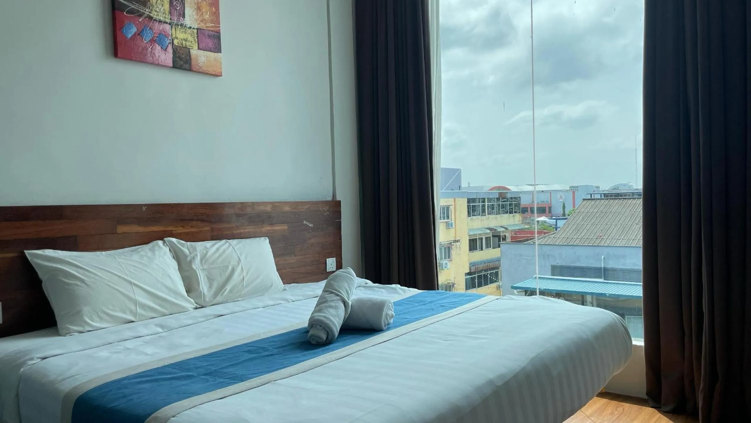 Bed in The Riverbank Hotel By MRVJ Business