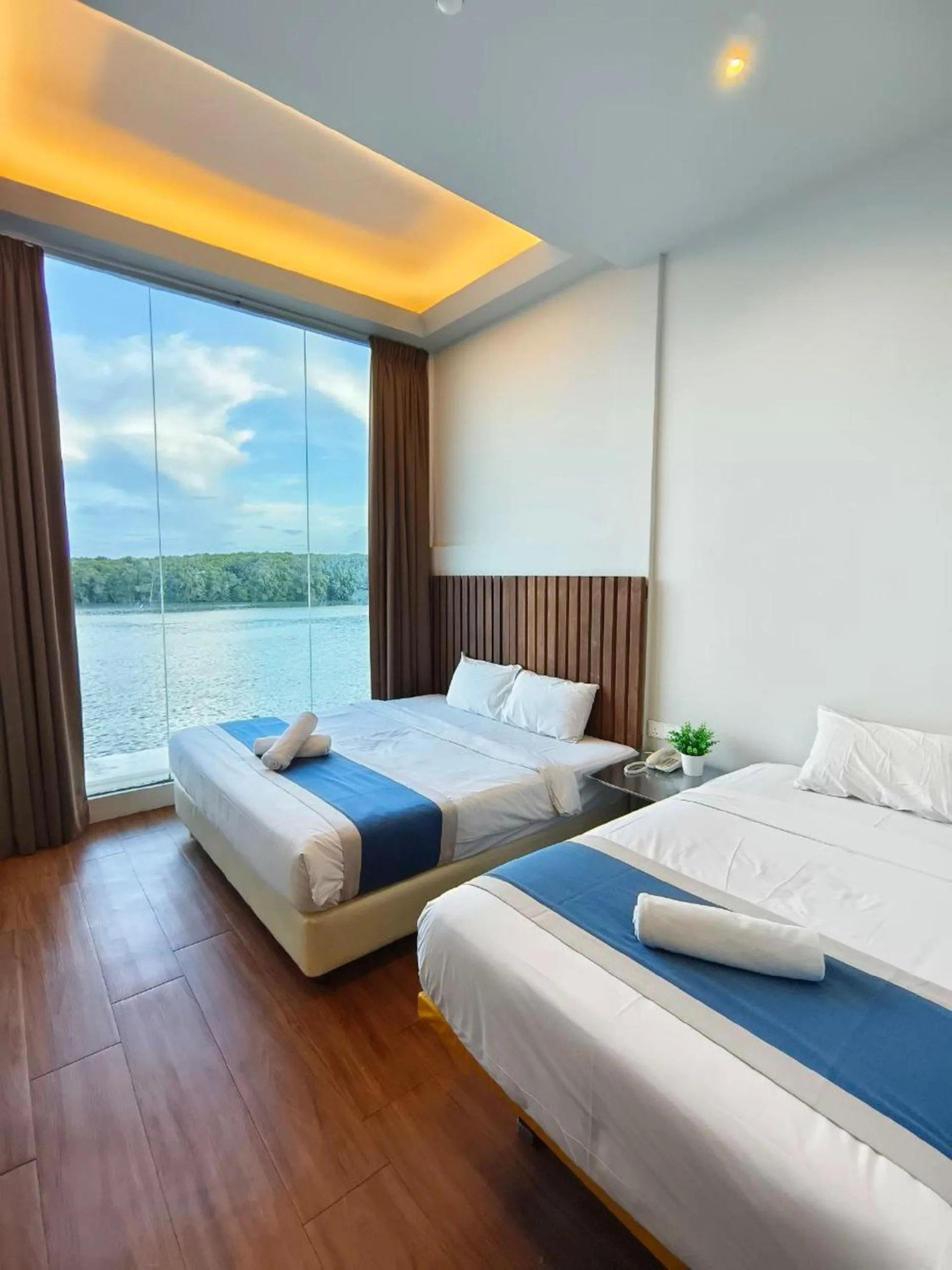 Bedroom, Bed in The Riverbank Hotel By MRVJ Business