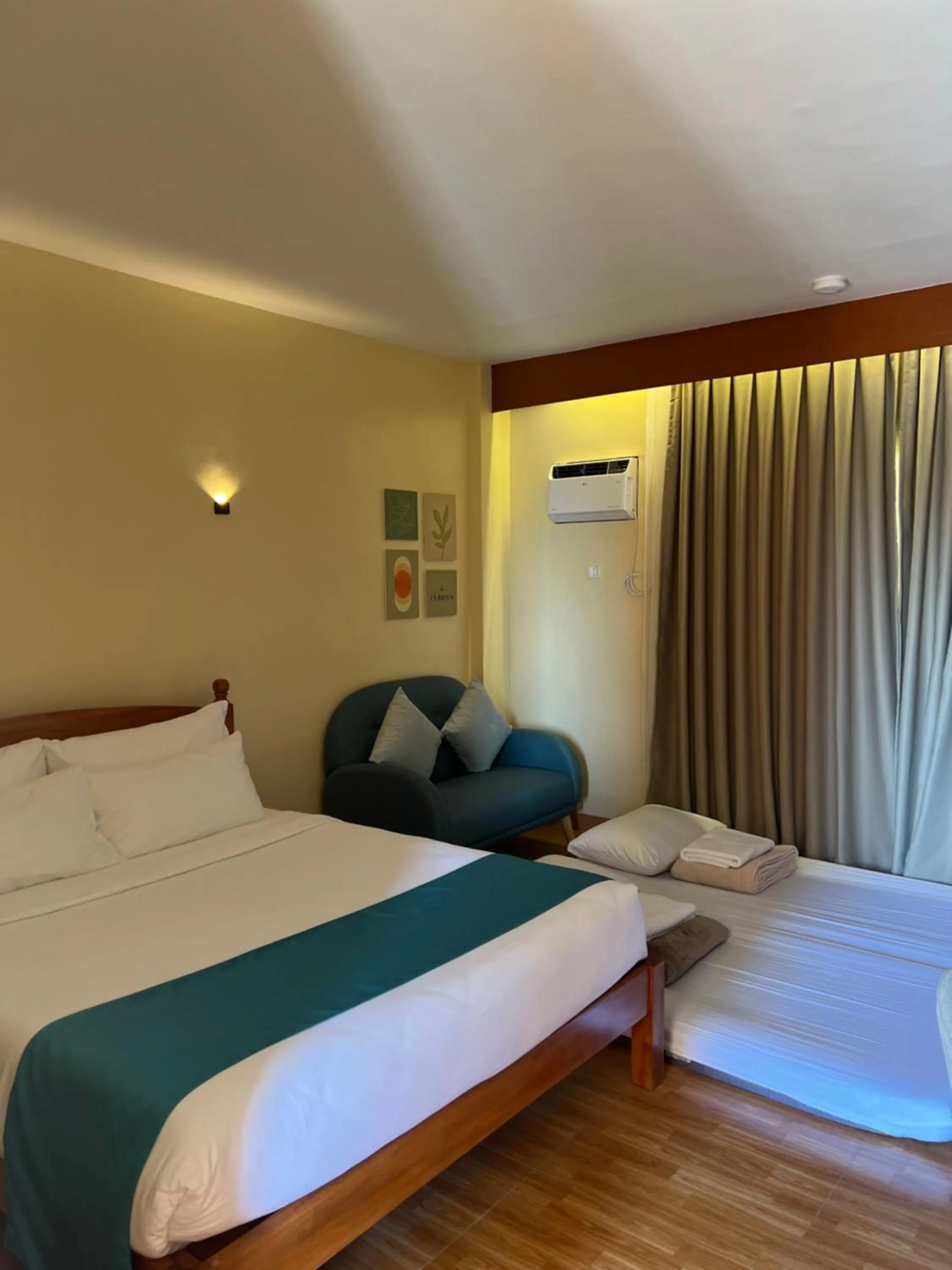 Bed in Rufana Suites