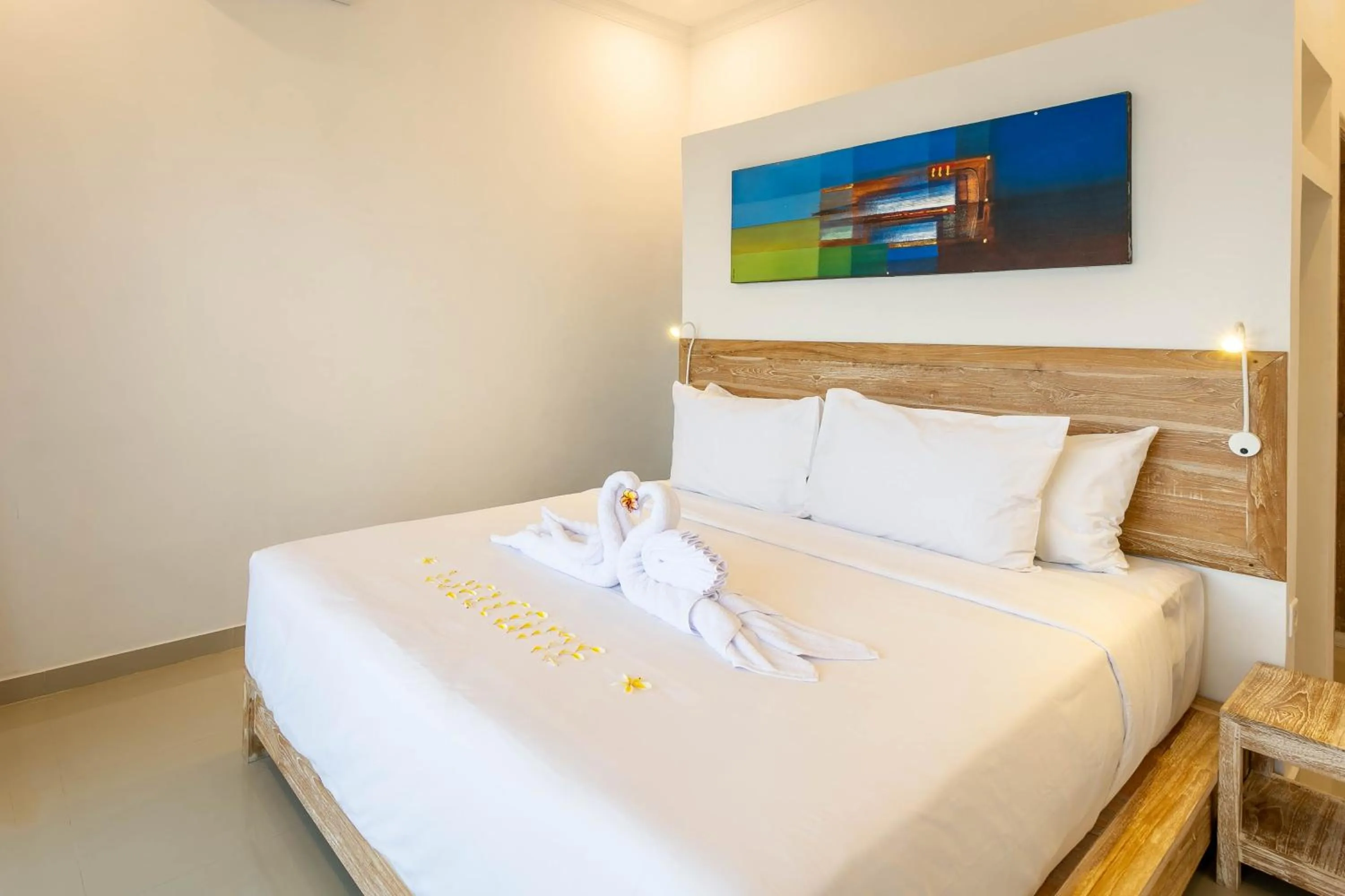 Bed in Utama Villas Beach Front Candidasa
