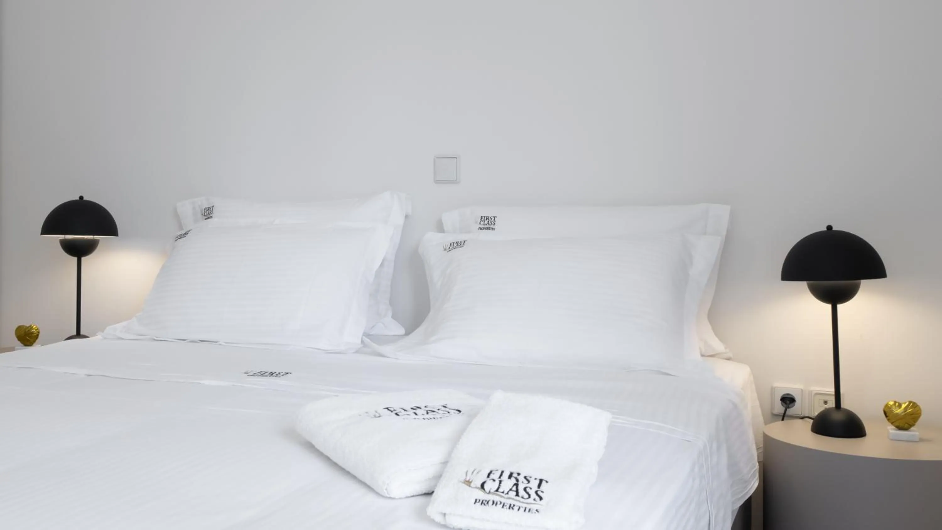 Bed in Vouliagmeni Honeymoon Suite by First Class Properties