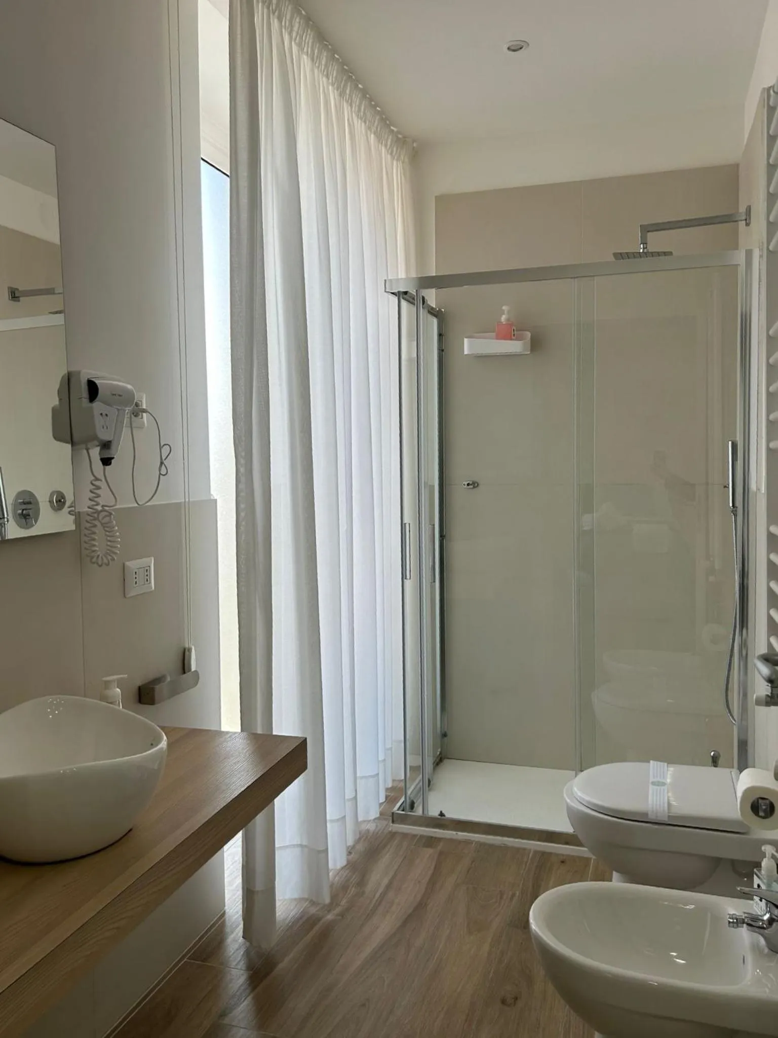 Shower in GIULY SUITES & ROOMS