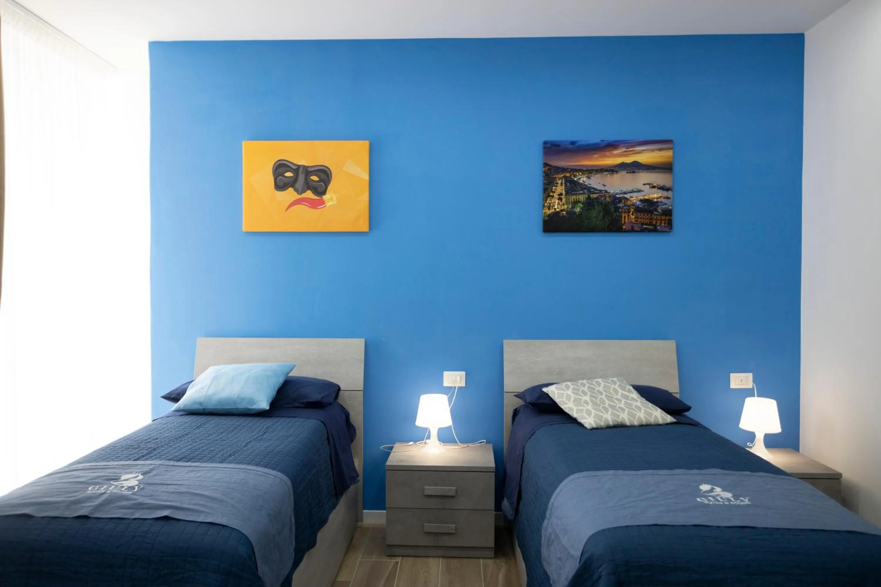 Bed in GIULY SUITES & ROOMS