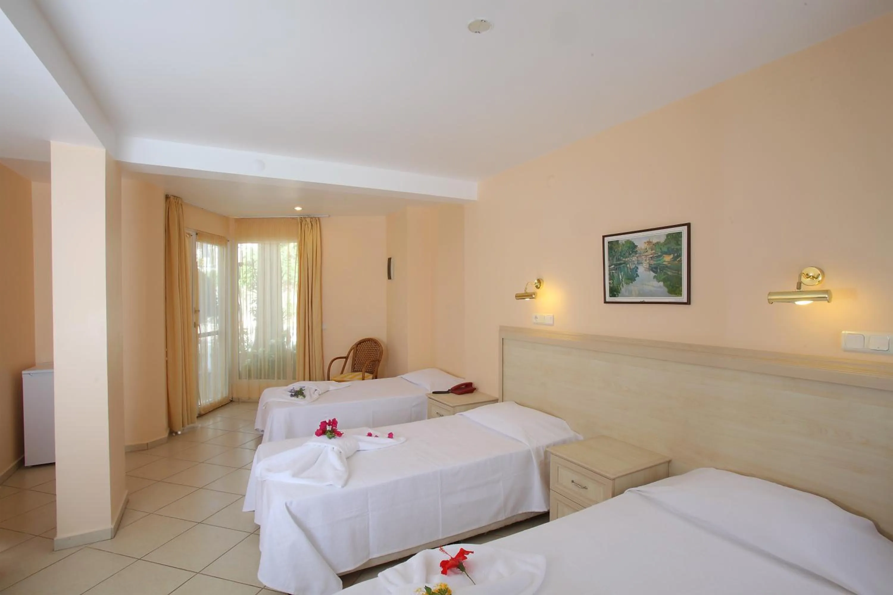 Bed in Catamaran Hotel