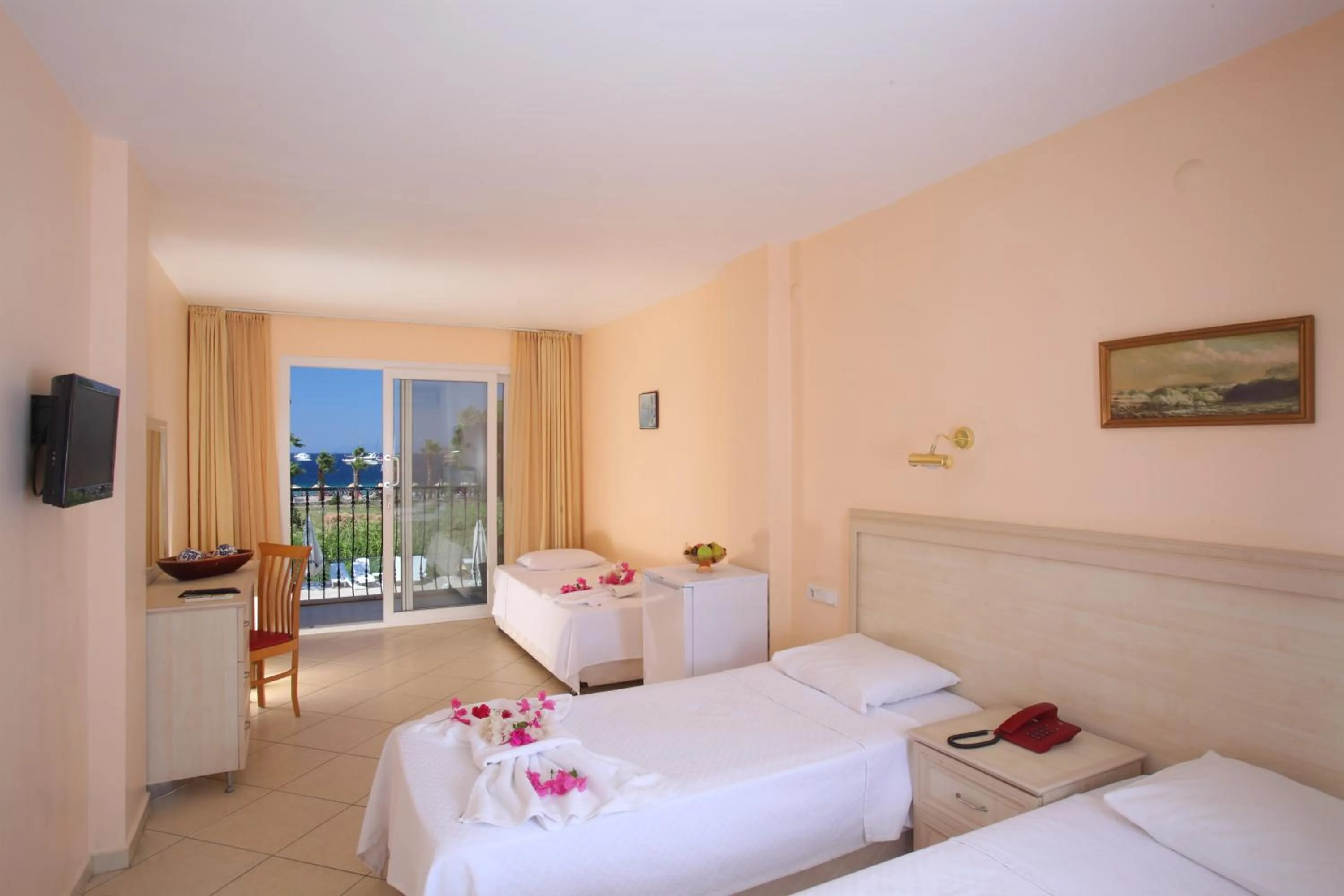 Bed in Catamaran Hotel