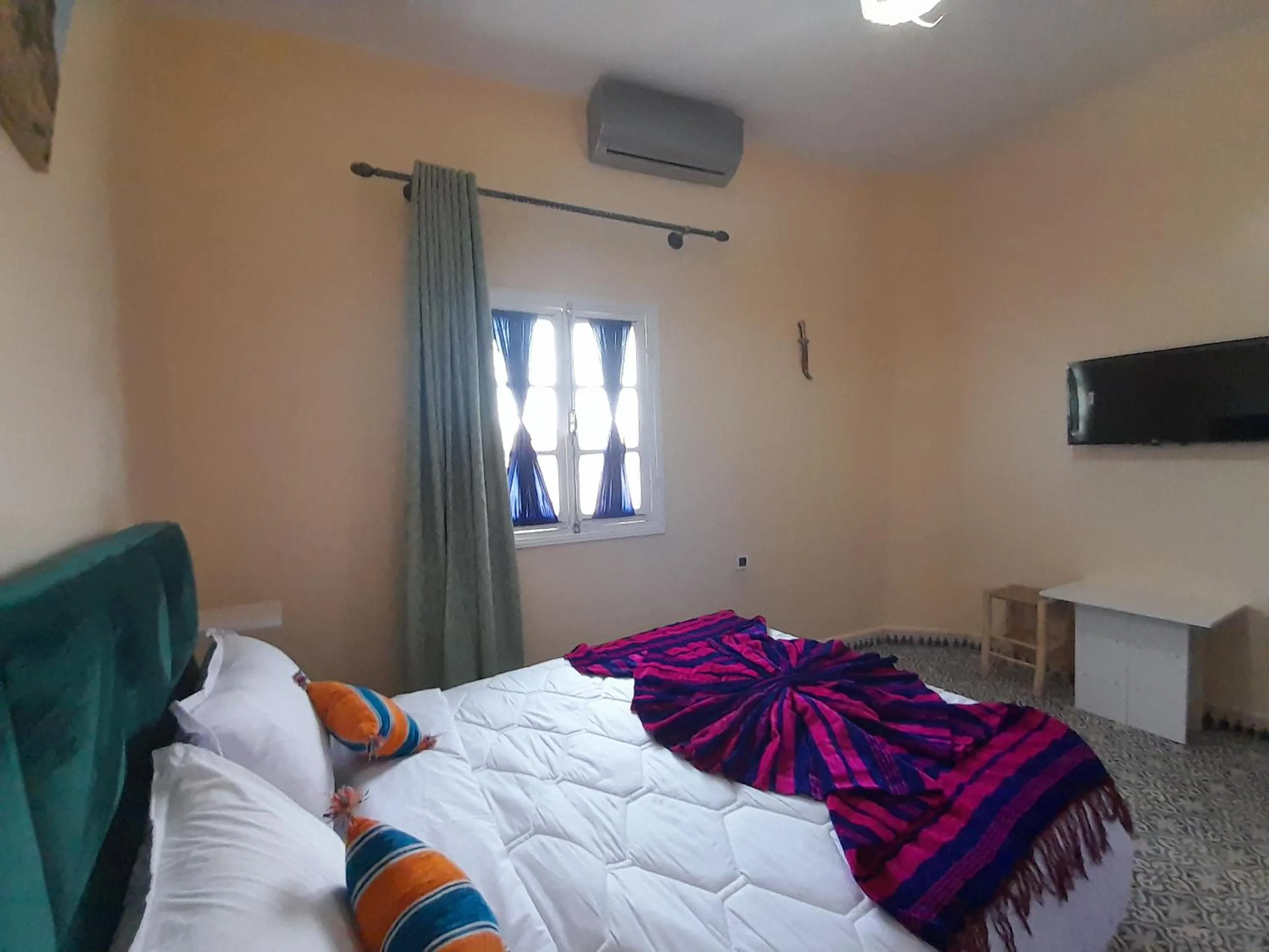 Bed in Hotel Mentaga