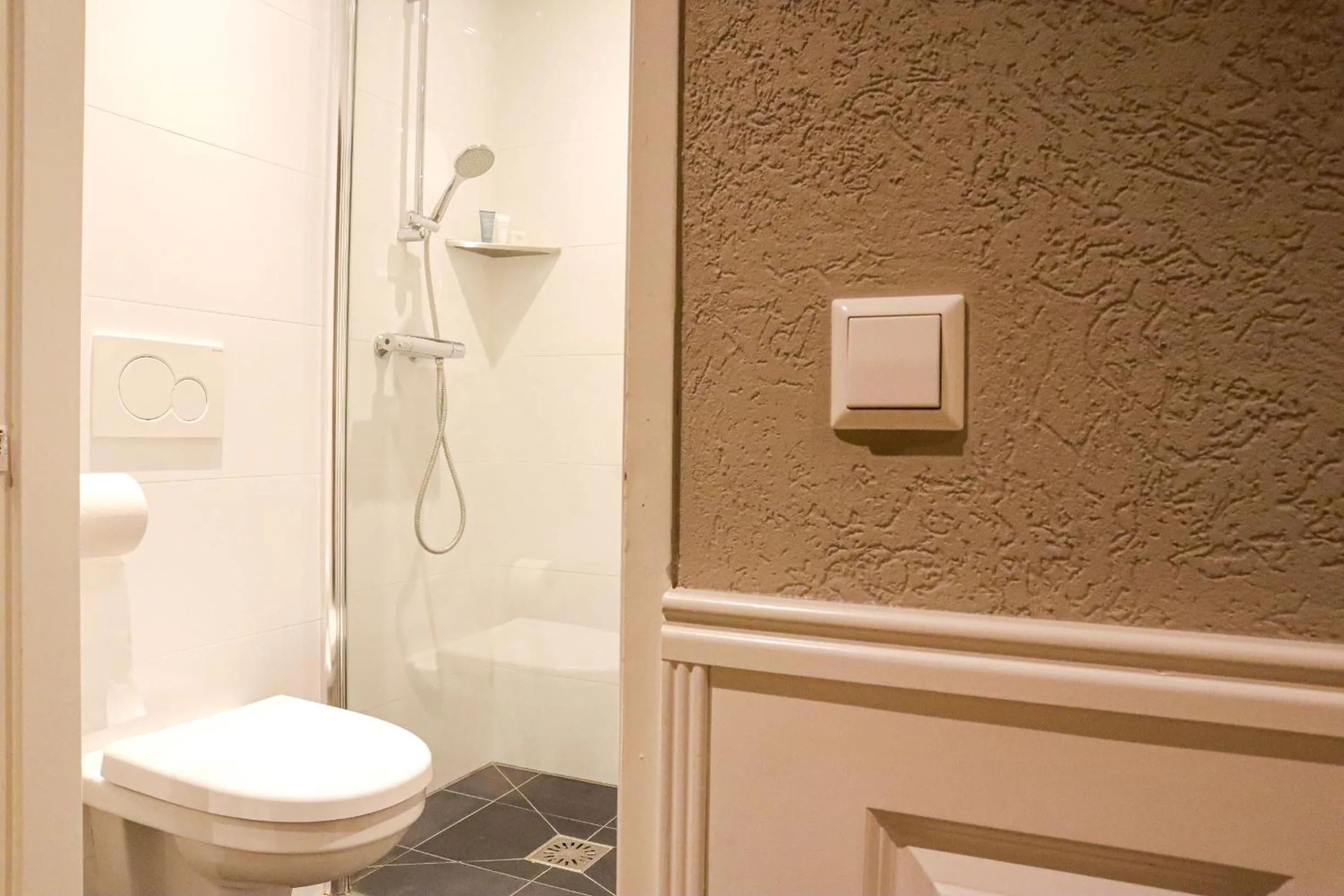 Bathroom in Hotel Asterisk, a family run hotel