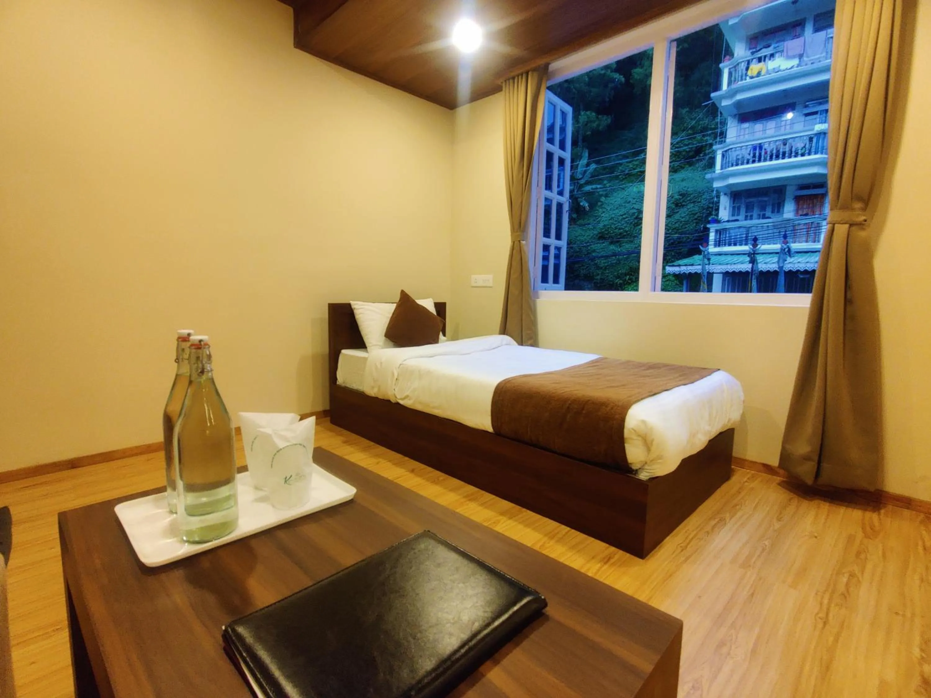 Bed in Keswani Group Tashi Heritage Hotel & Resort