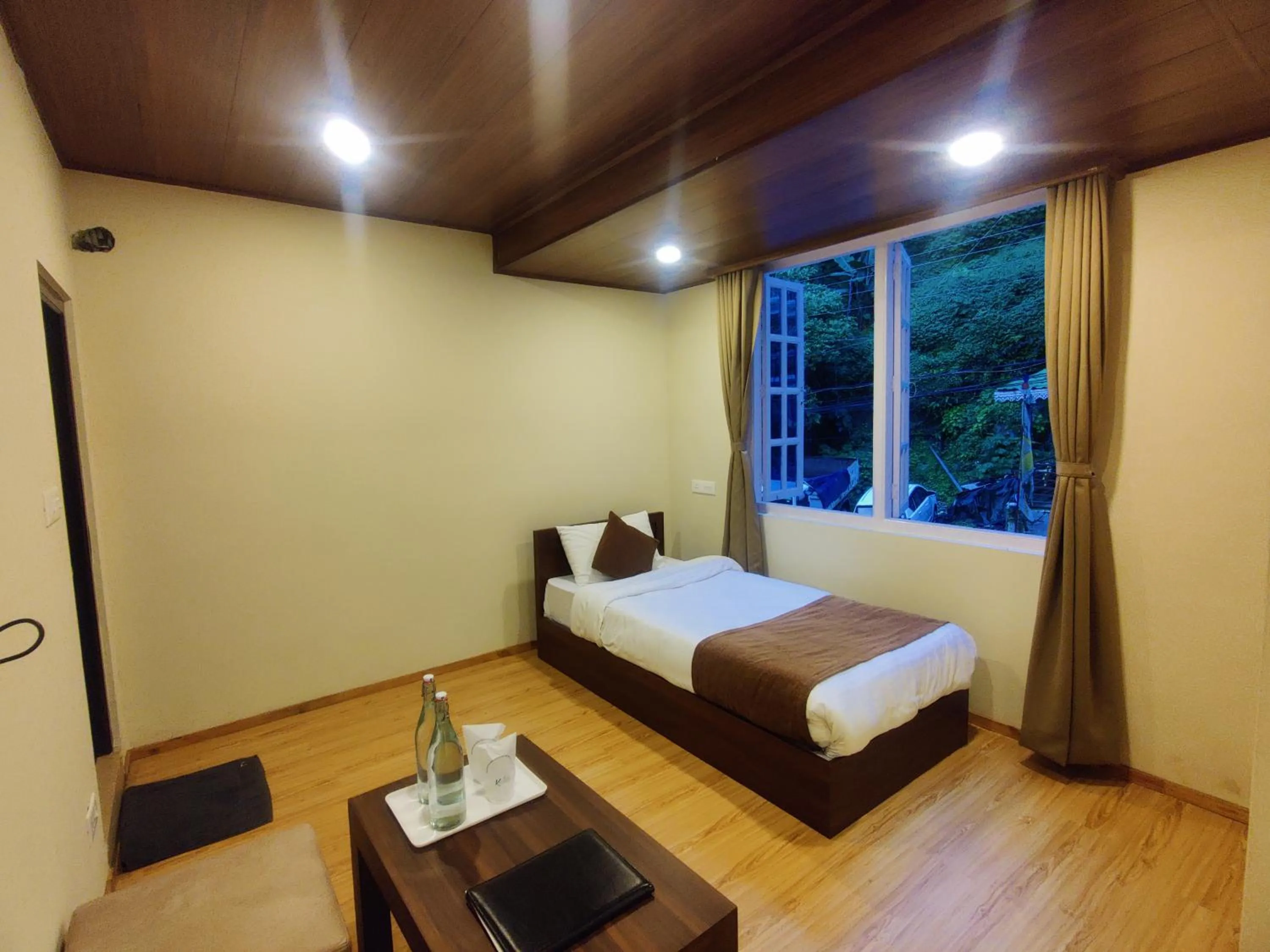 Bed in Keswani Group Tashi Heritage Hotel & Resort
