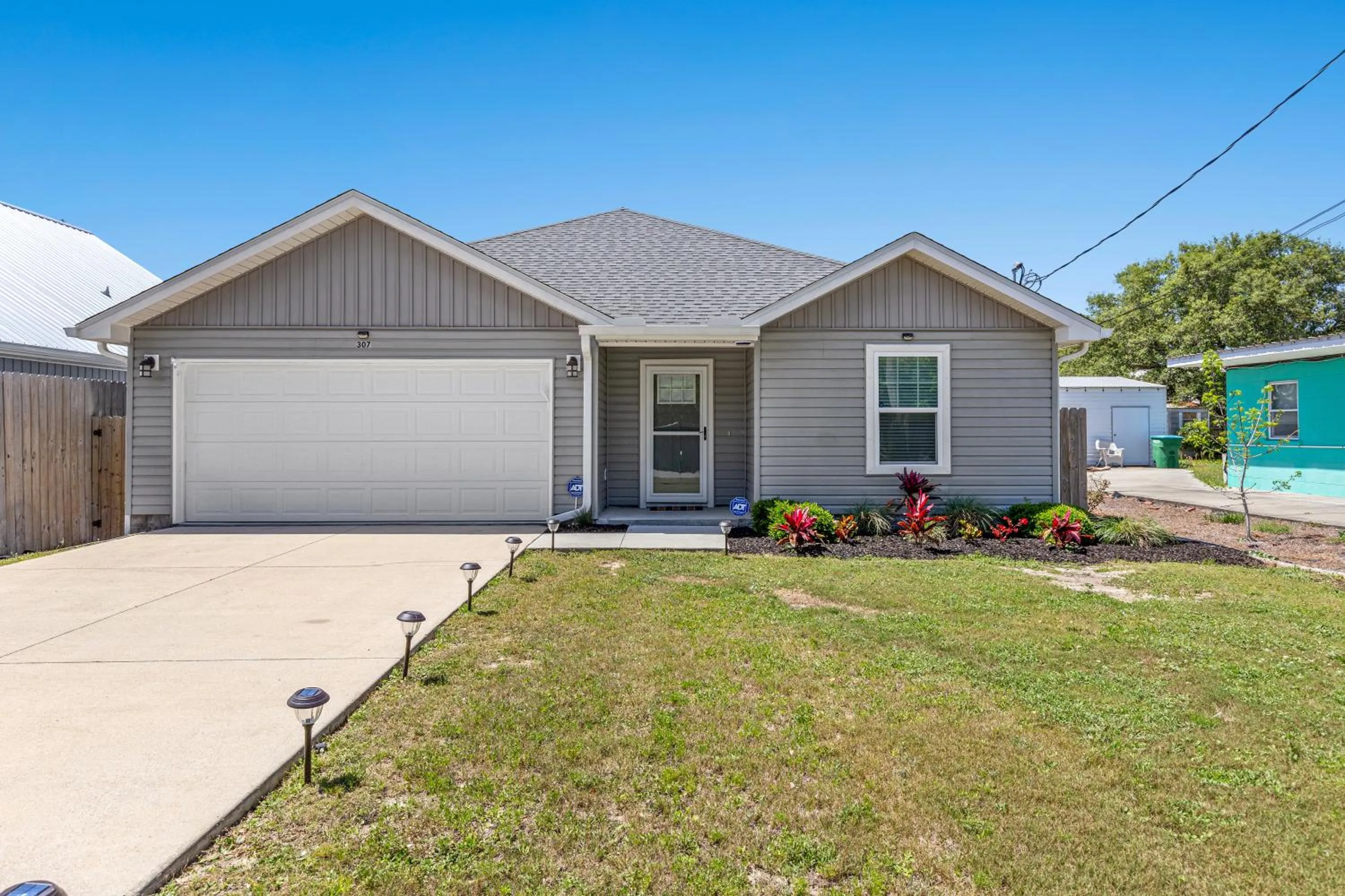 Property building in 3BD, 2BA Home! Family Friendly! Close to Beach! HOT TUB!