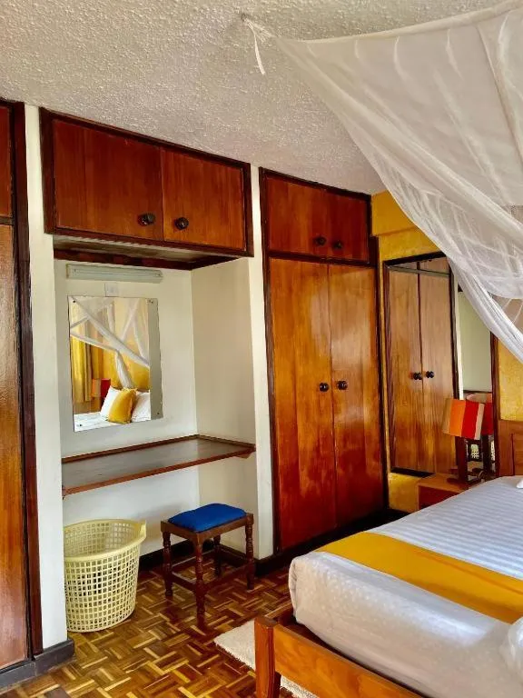 Bed in Kenya Comfort Suites