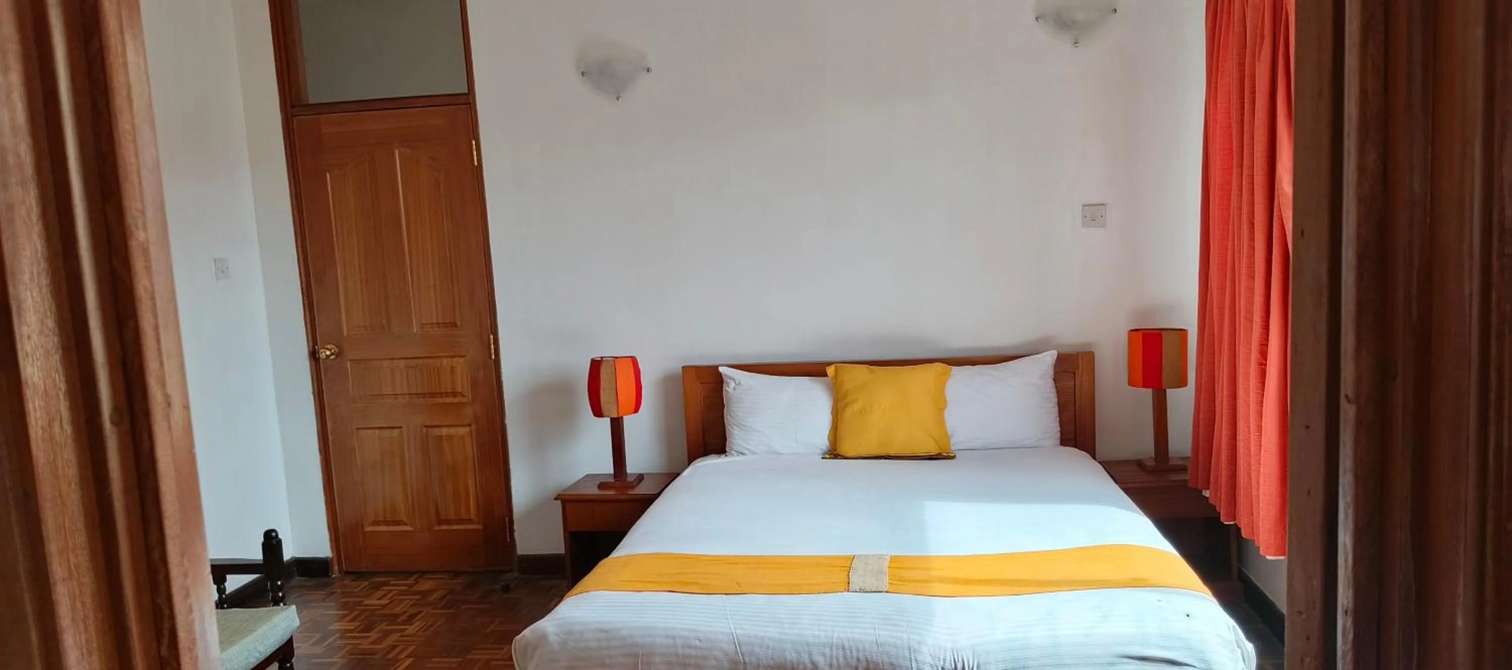 Bed in Kenya Comfort Suites