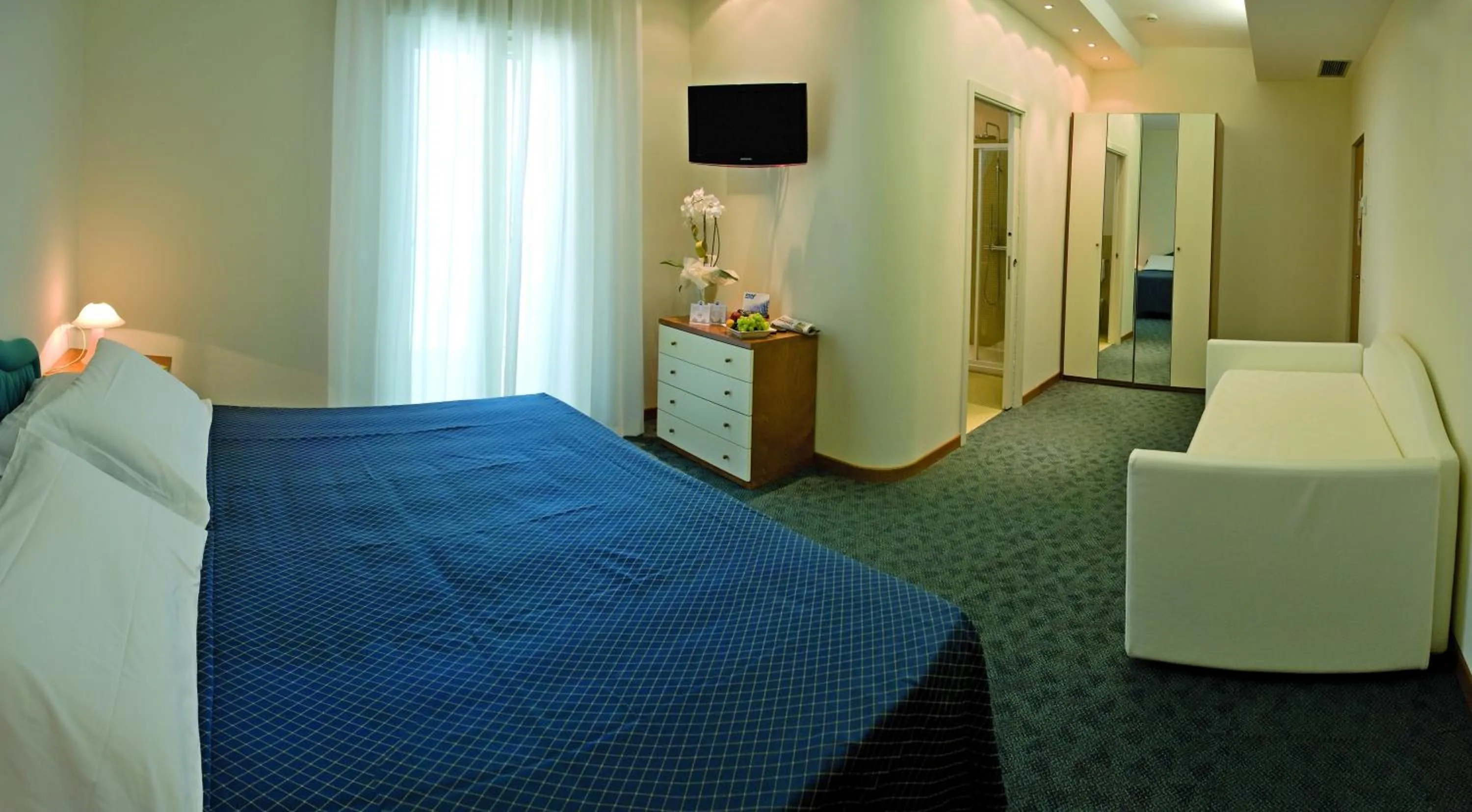 Bed in Hotel Sorriso