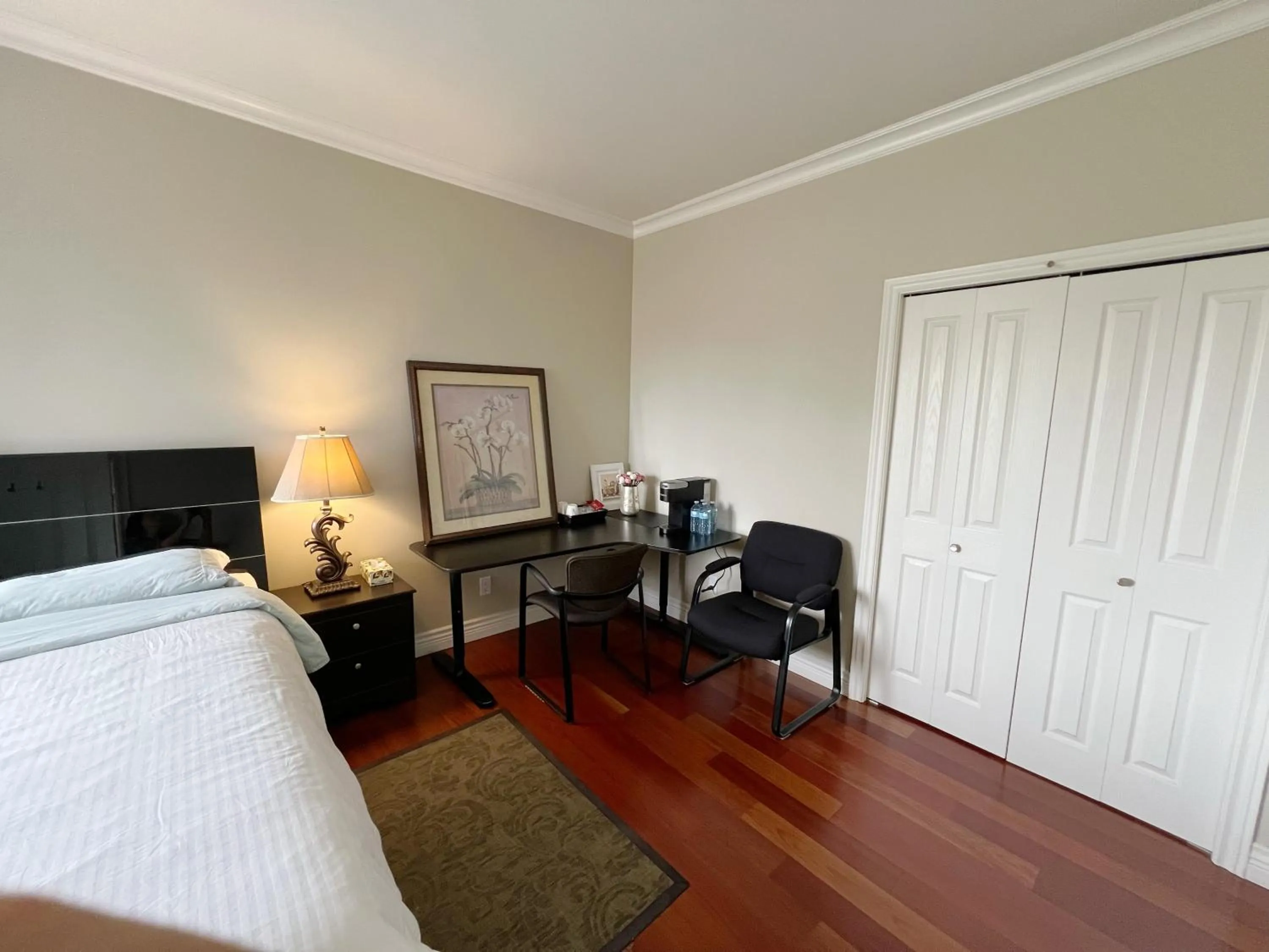 Bed in A cozy independent entrance bedroom with a private washroom close to YVR Richmond