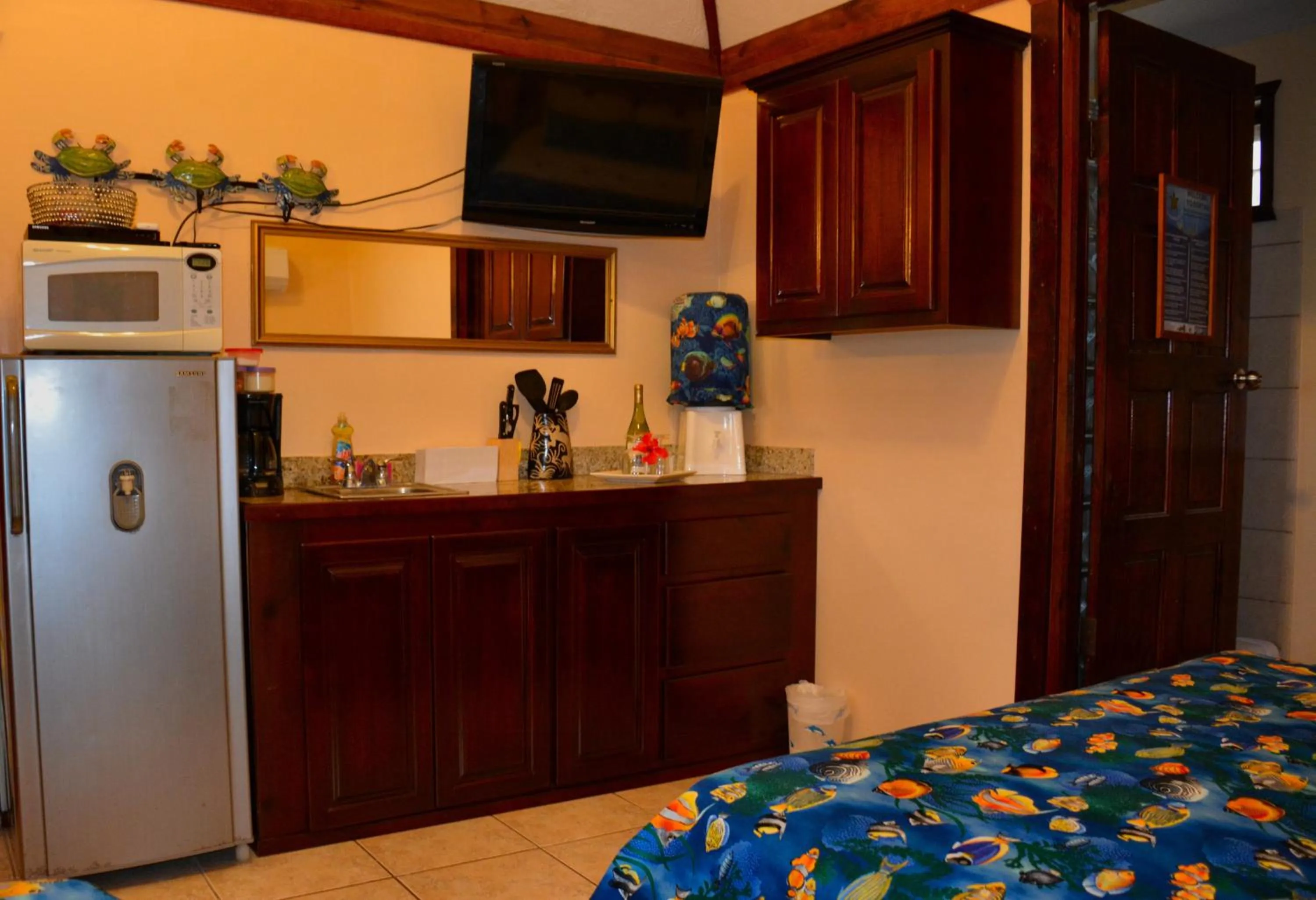 Kitchen or kitchenette, Bed in West Bay Lodge and Spa