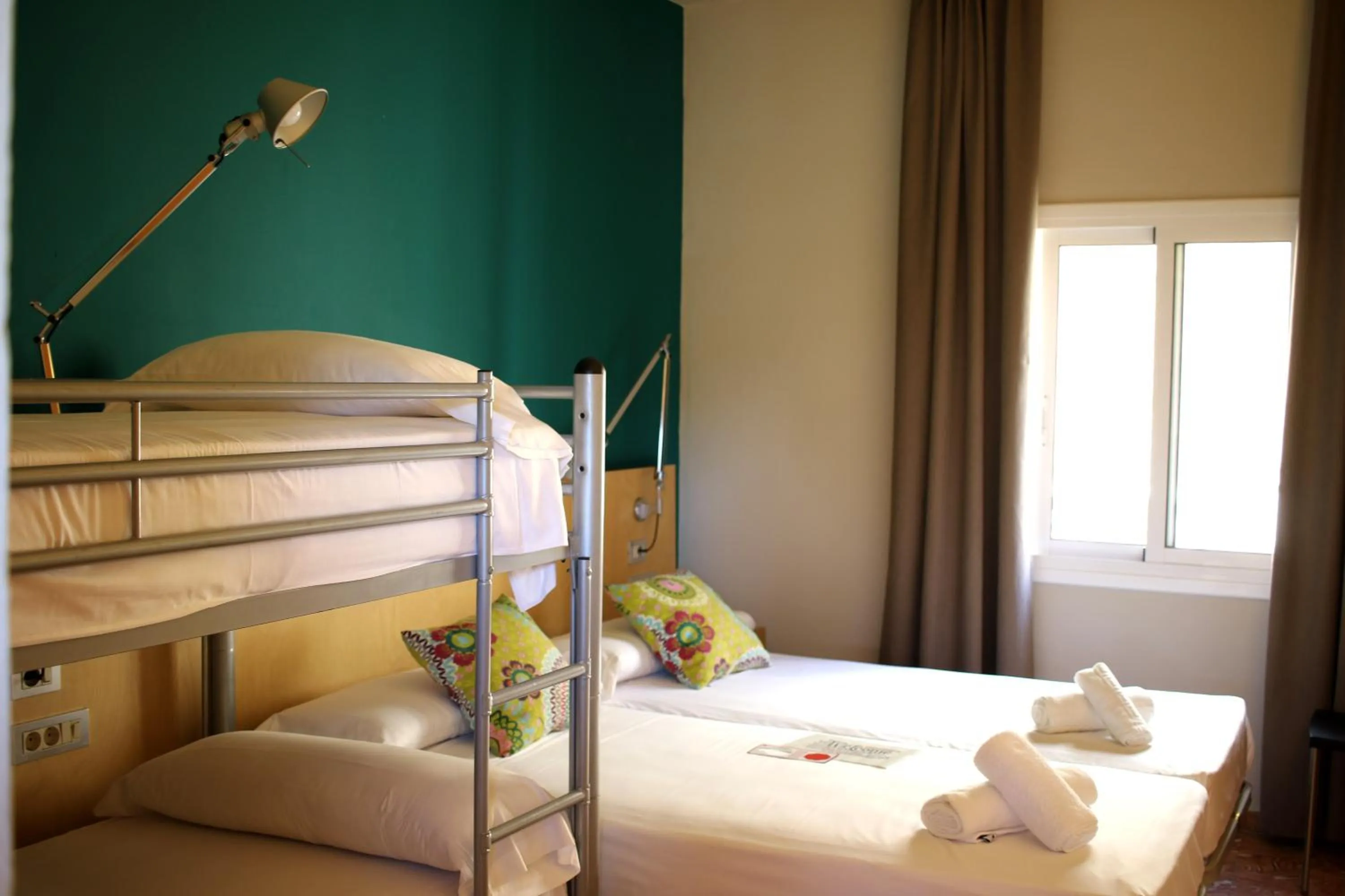 Bed in Hostal La Fosca