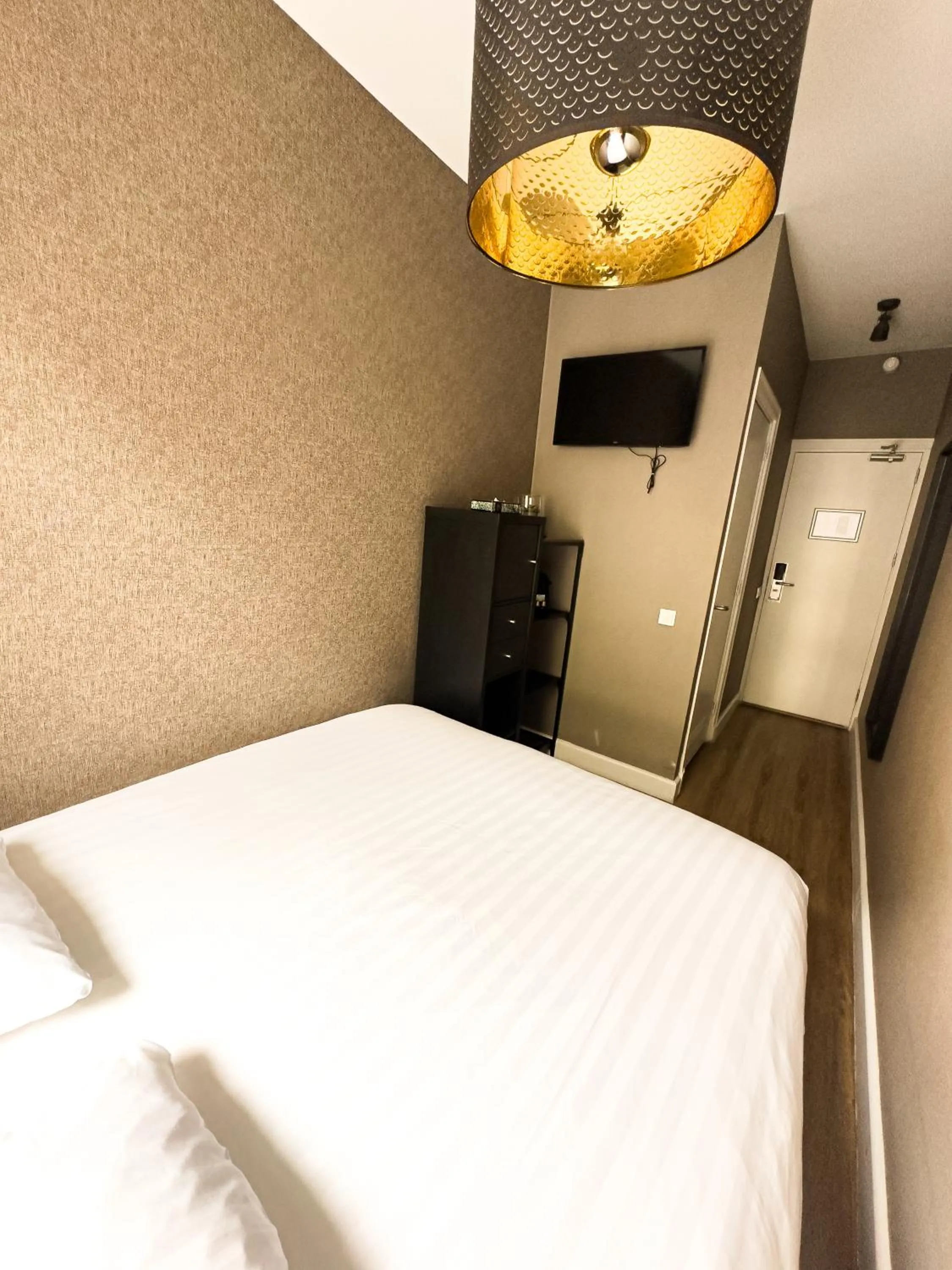 Bed in Hotel Vondel Garden