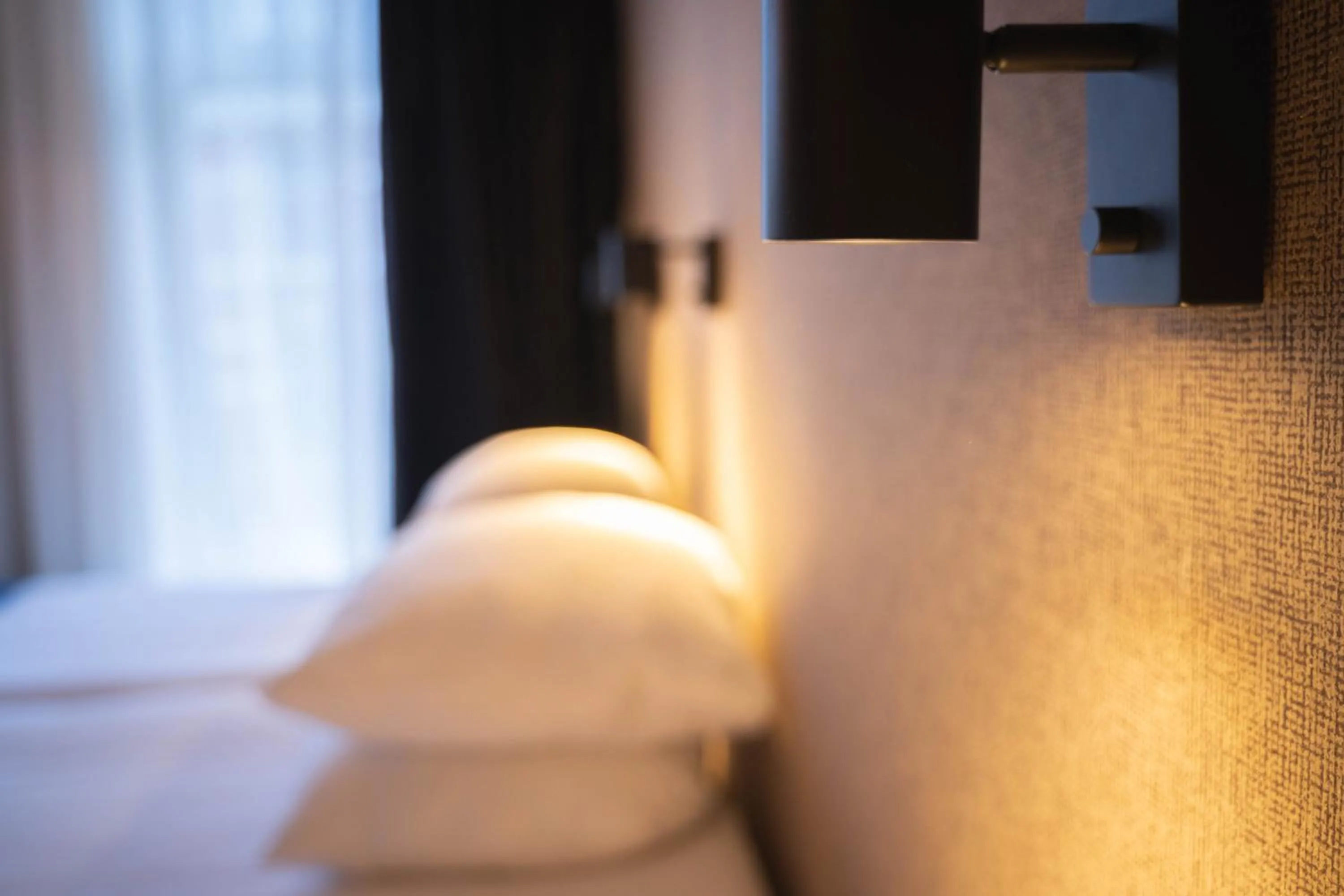 Bed in Hotel Vondel Garden