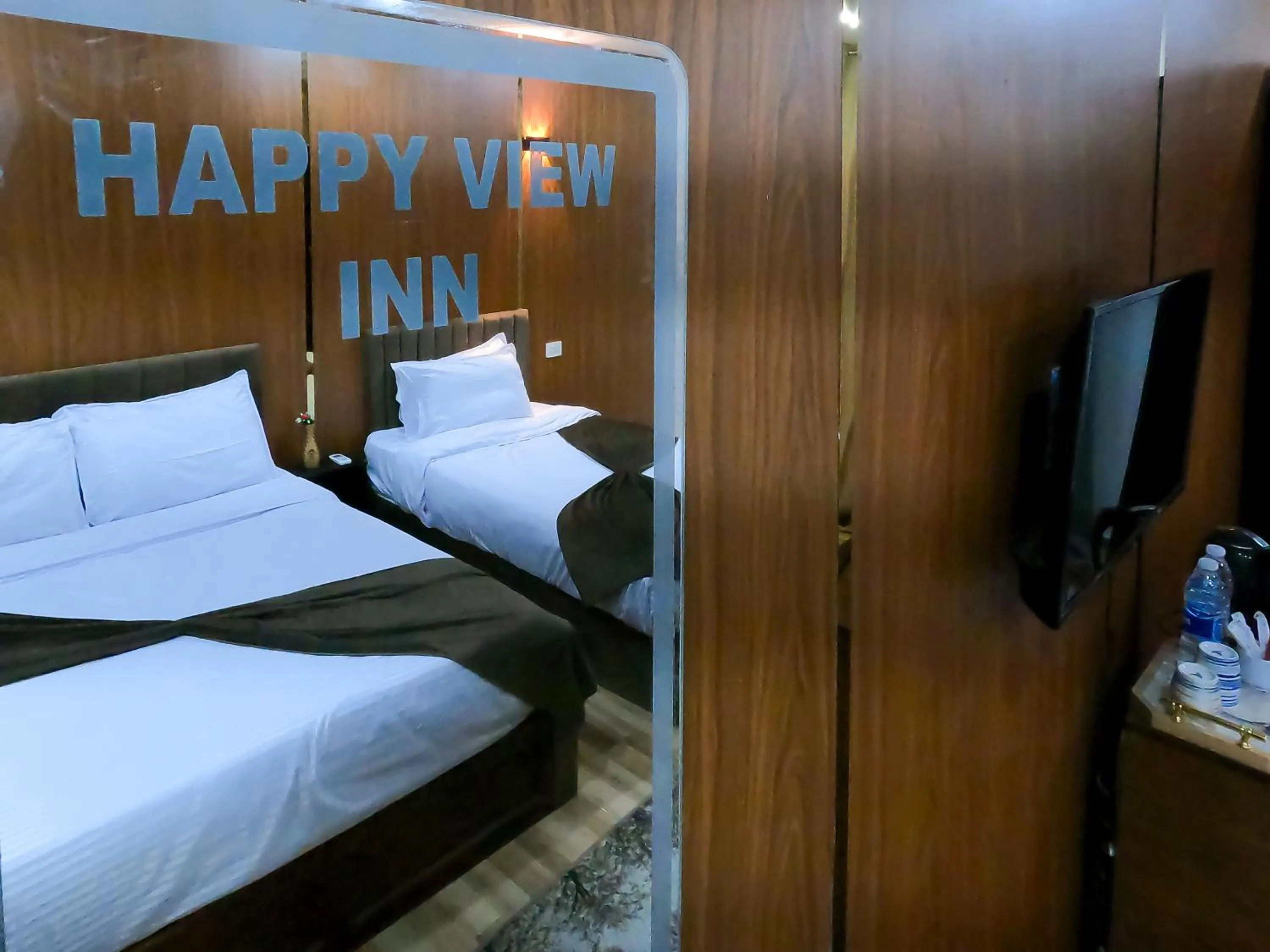 Bed in Happy View Inn