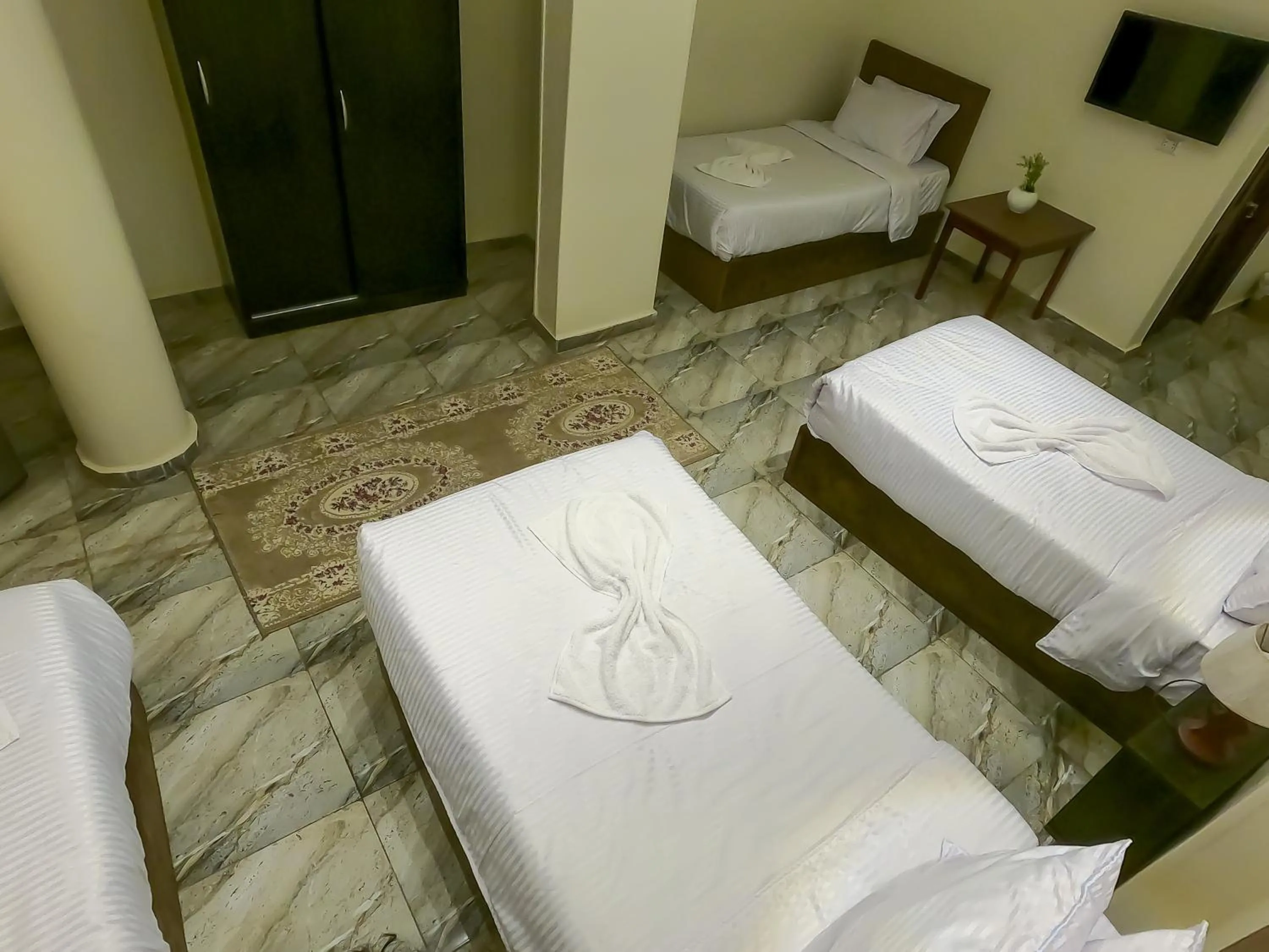 Bed in Happy View Inn