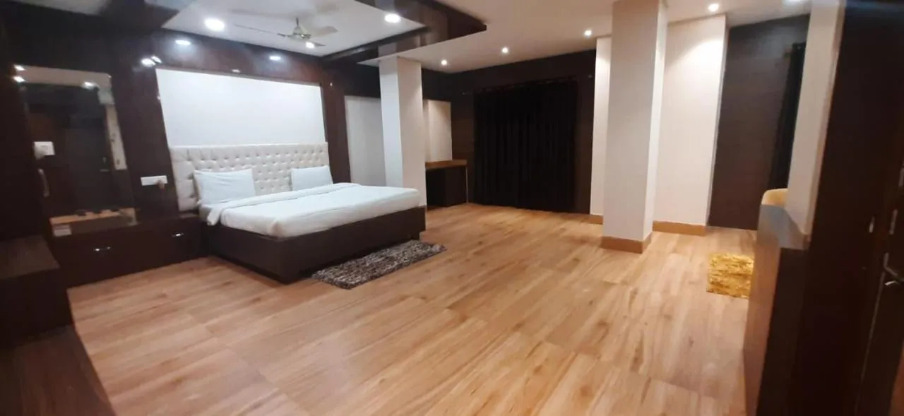 Bed in ROYAL CHETAN INN