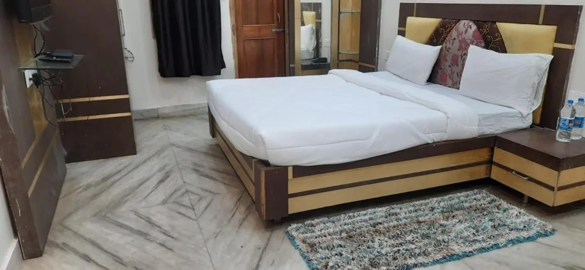 Bed in ROYAL CHETAN INN