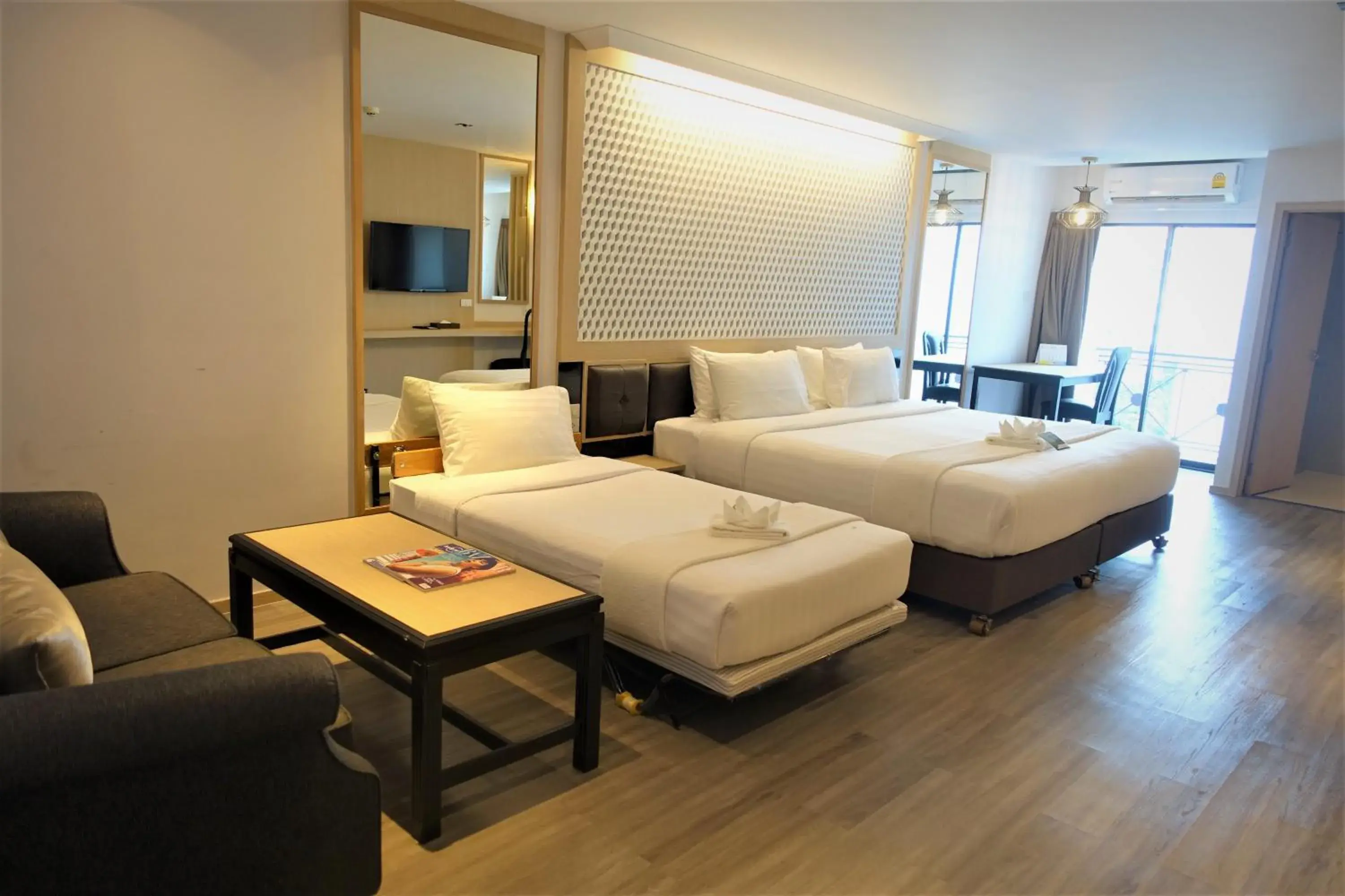 Triple Family Room in Three Sukhumvit Hotel - SHA Plus Certified Triple Family Room in Three Sukhumvit Hotel - SHA Plus Certified