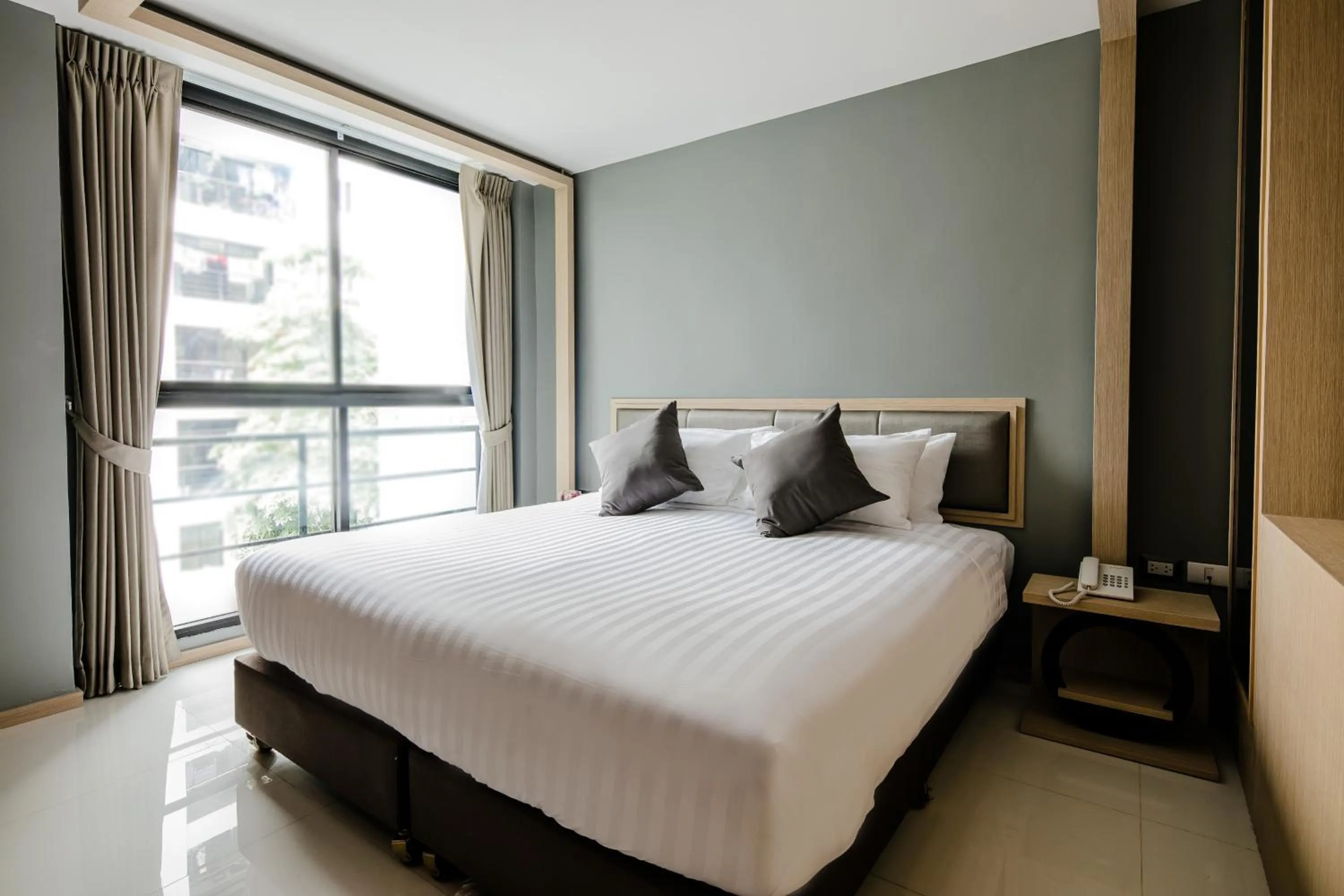 Bedroom, Bed in Three Sukhumvit Hotel - SHA Plus Certified