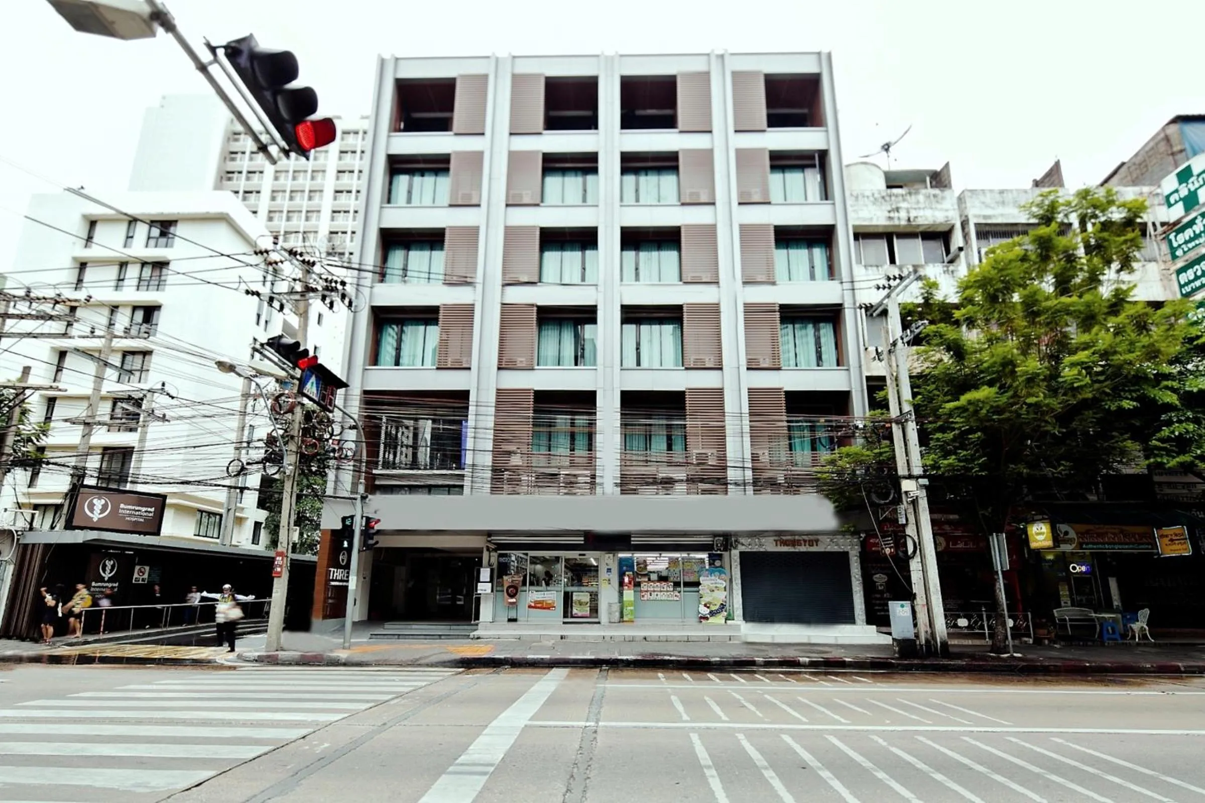 Property building in Three Sukhumvit Hotel - SHA Plus Certified