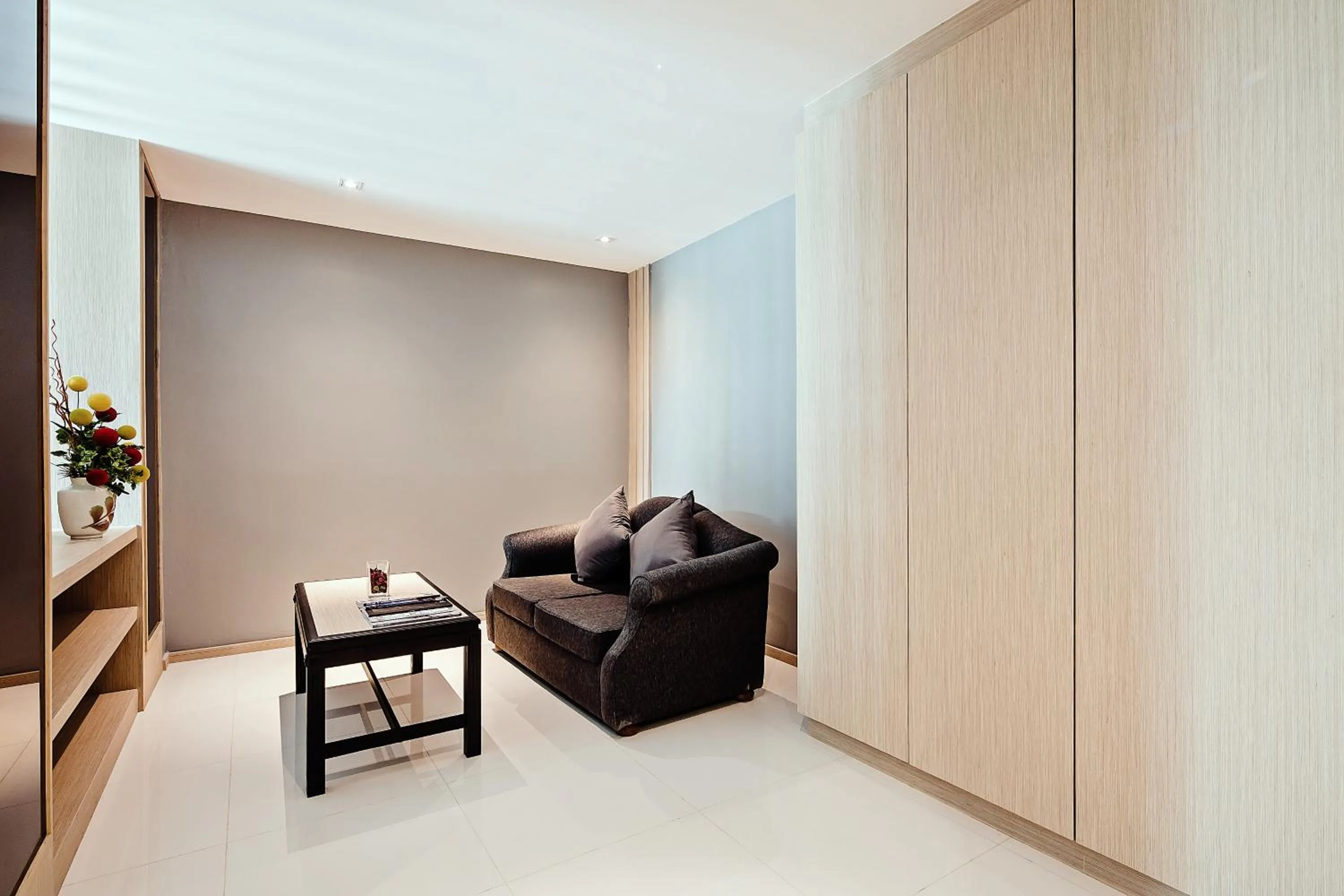 Living room in Three Sukhumvit Hotel - SHA Plus Certified